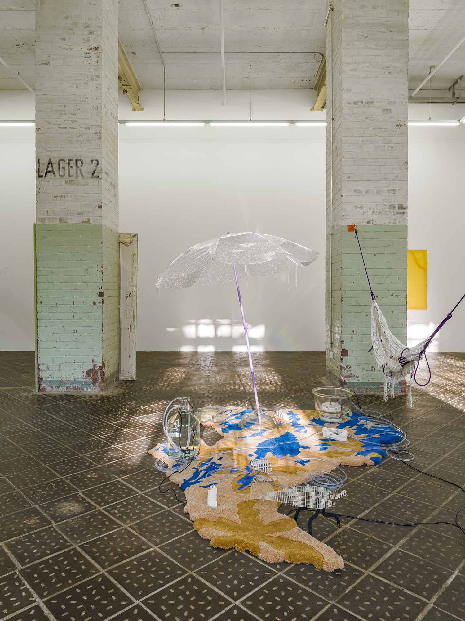 Andrea Garcia Vasquez, âSynthesize Sympathize: A Sphere of Breath and A Detached Dispositionâ, 2024, wool,synthetic yarns,glass,Aluminium, 3D printed Porcelain, Broken iPhone8, water pumps, water, rubber tubes, aromatic aromas circa 4 m2 x 2 m