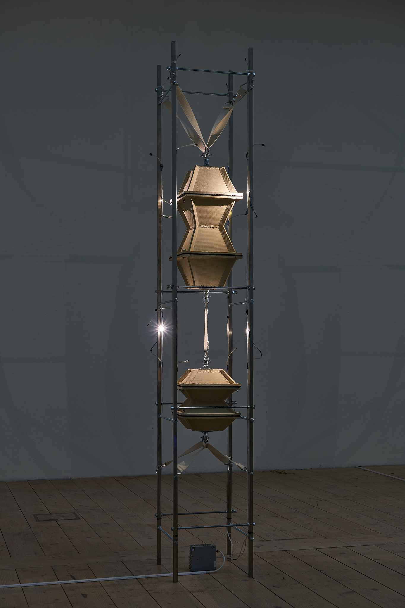 <Nach dem Tod_Collepsed Stone tower became stone, 2024> 34 x 34 x 203(h)cm, Stainless steel, Ceramic, steel, cotton, rubber, LED