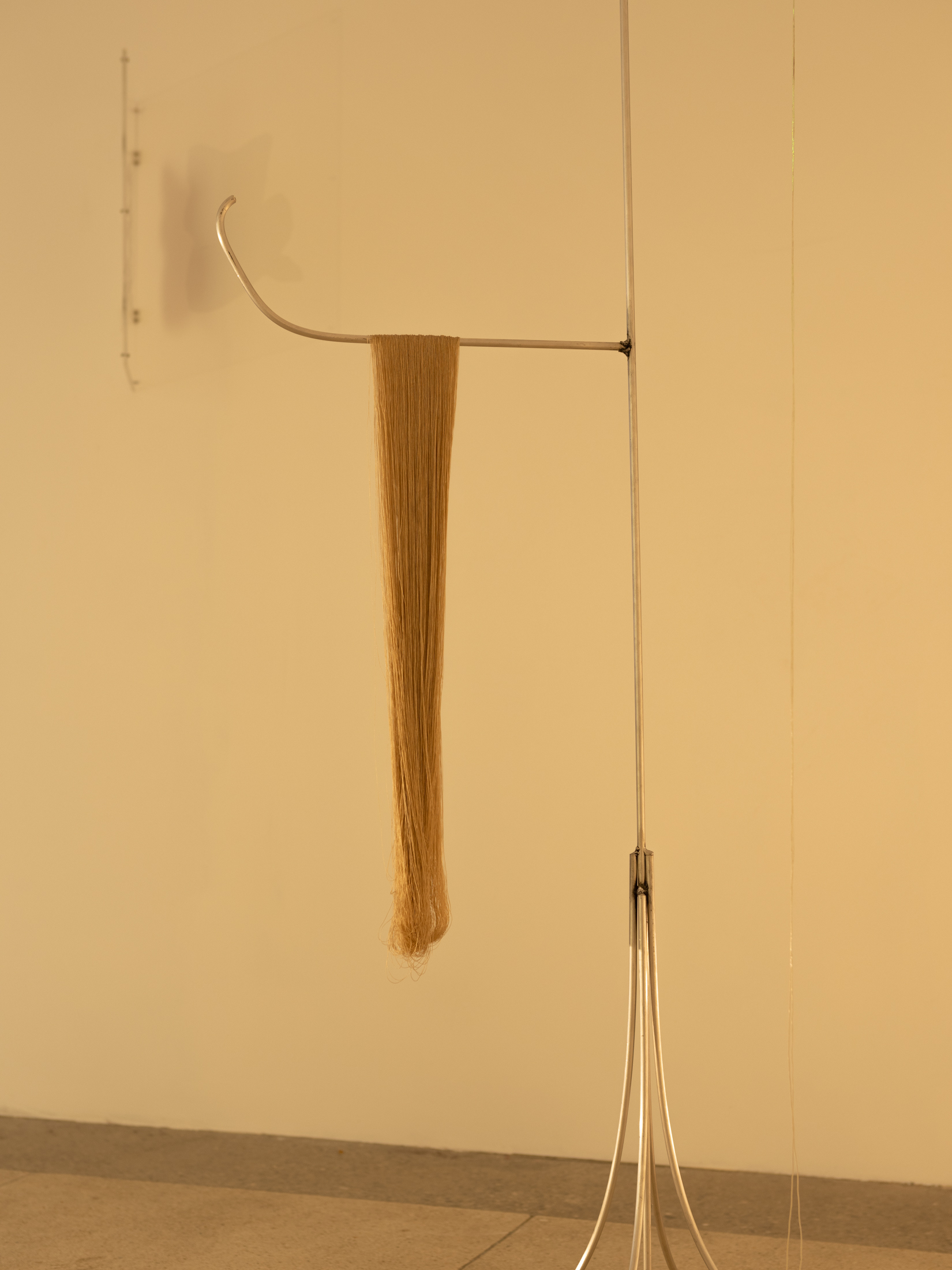 Eglė Petrošiūtė “Barely Hanging on”, aluminium, silk, silicone