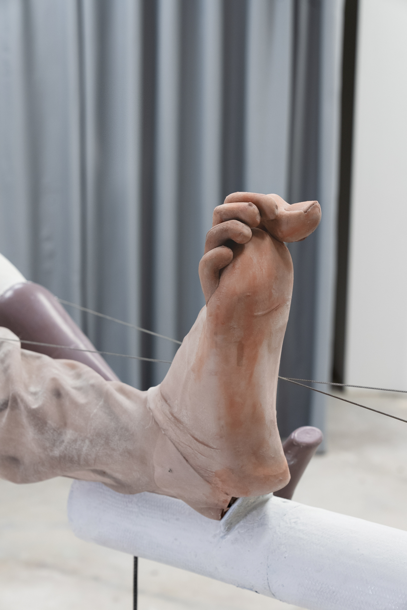 Detail: Manuel Cornelius, Sculpture for a Mall (trying on socks), 2022