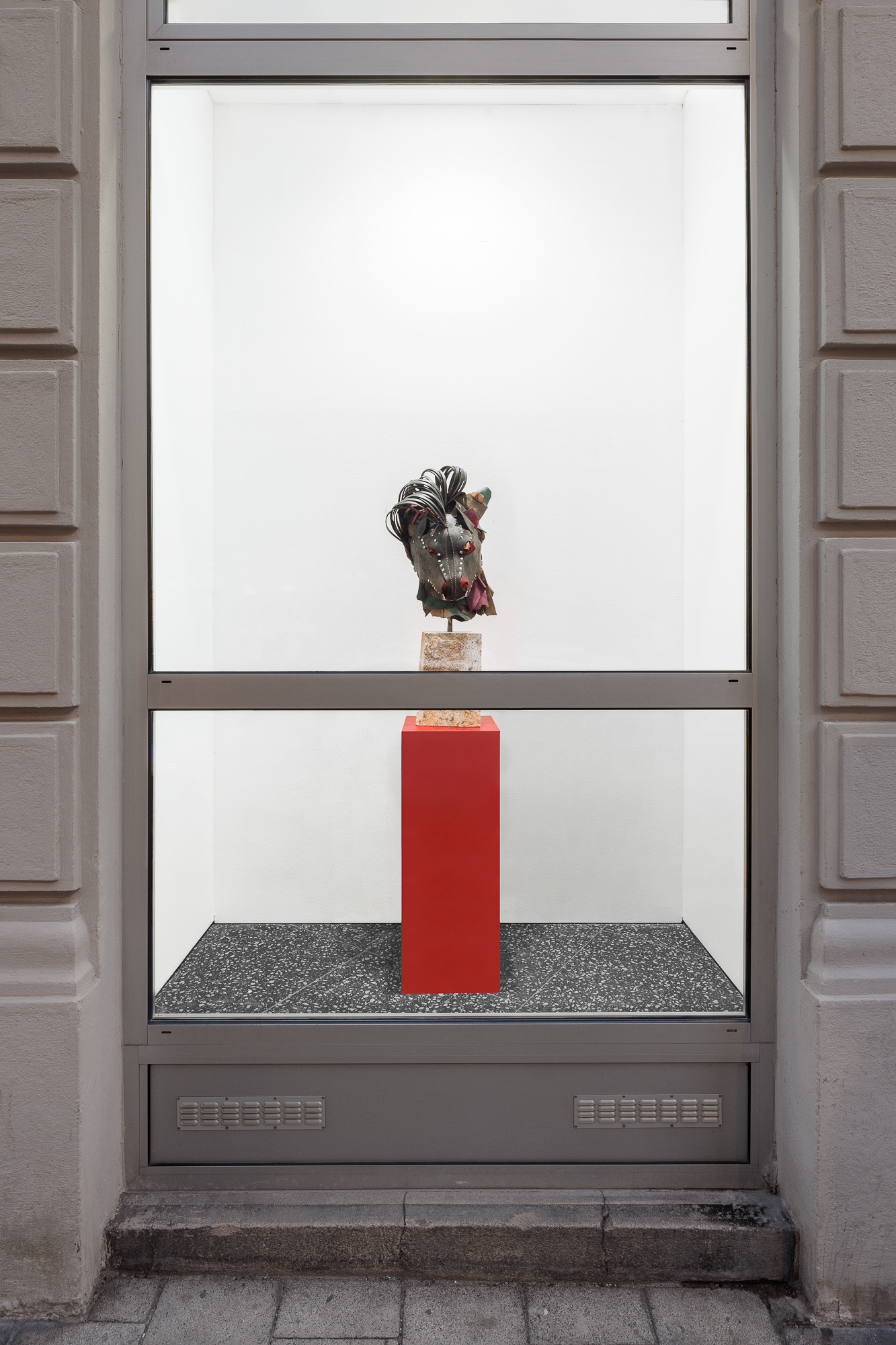 Lena Henke, Memory of a Young Sculpture XO, 2024, Soldered and boiled leather, pigment and steel mounted on Austrian granite, on wooden pedestal, 30 × 30 × 167 cm 