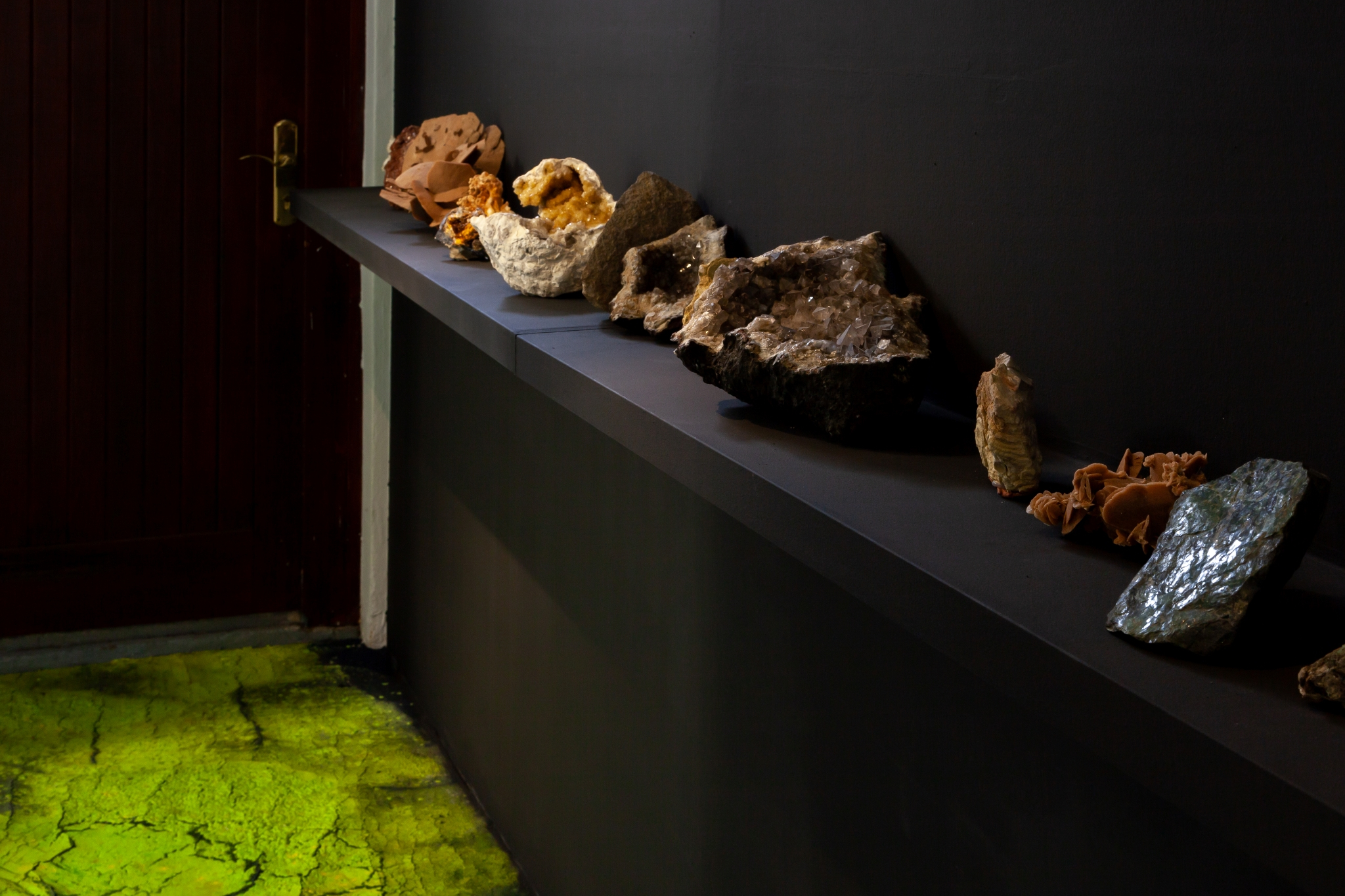 "Moon, she said...", installation view, stones and minerals from Lukasâs ancestors collection; Hugo Canoilas, painted industrial carpet