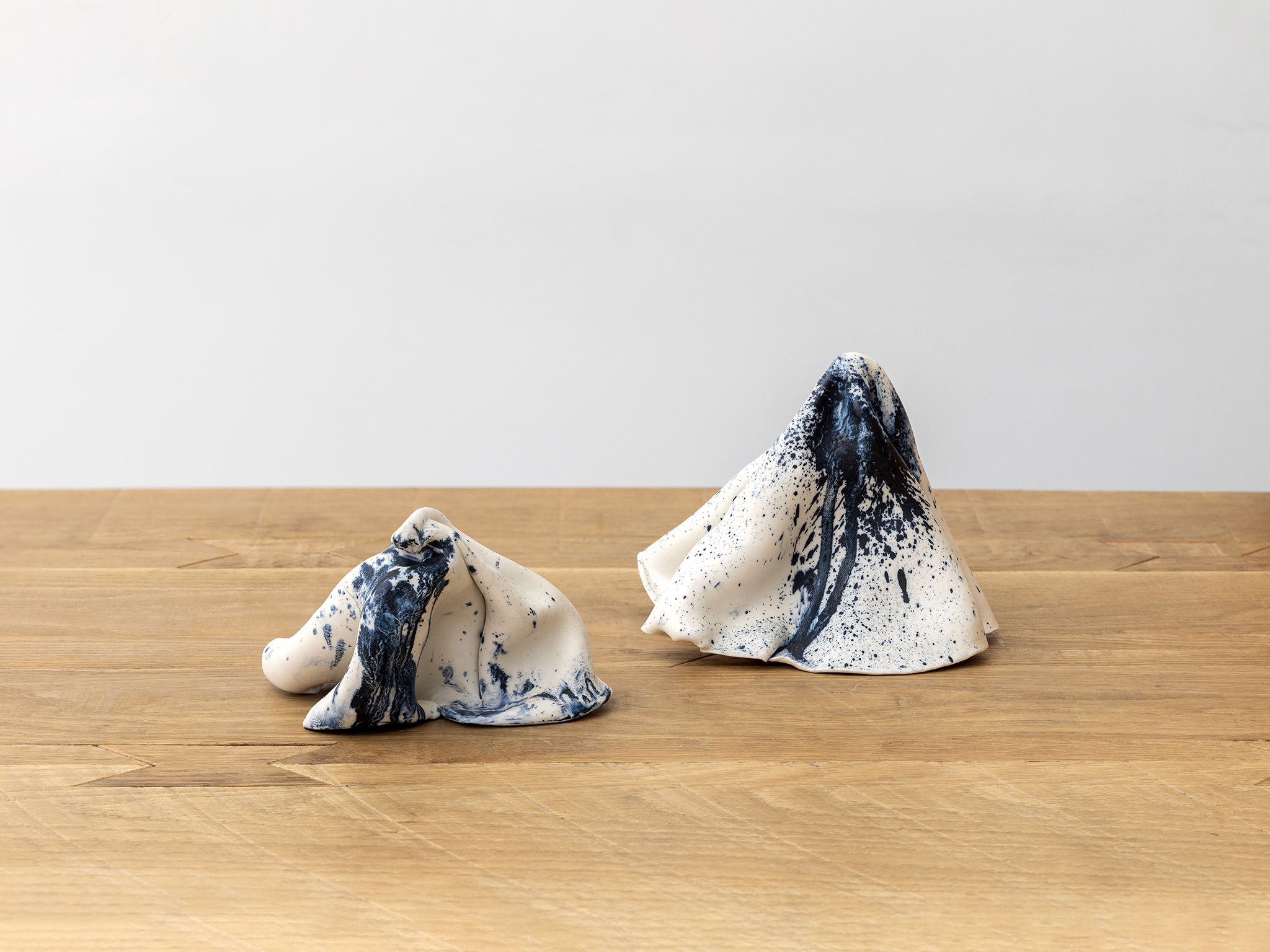 Untitled, 2024, cobalt on porcelain clay, variable dimensions