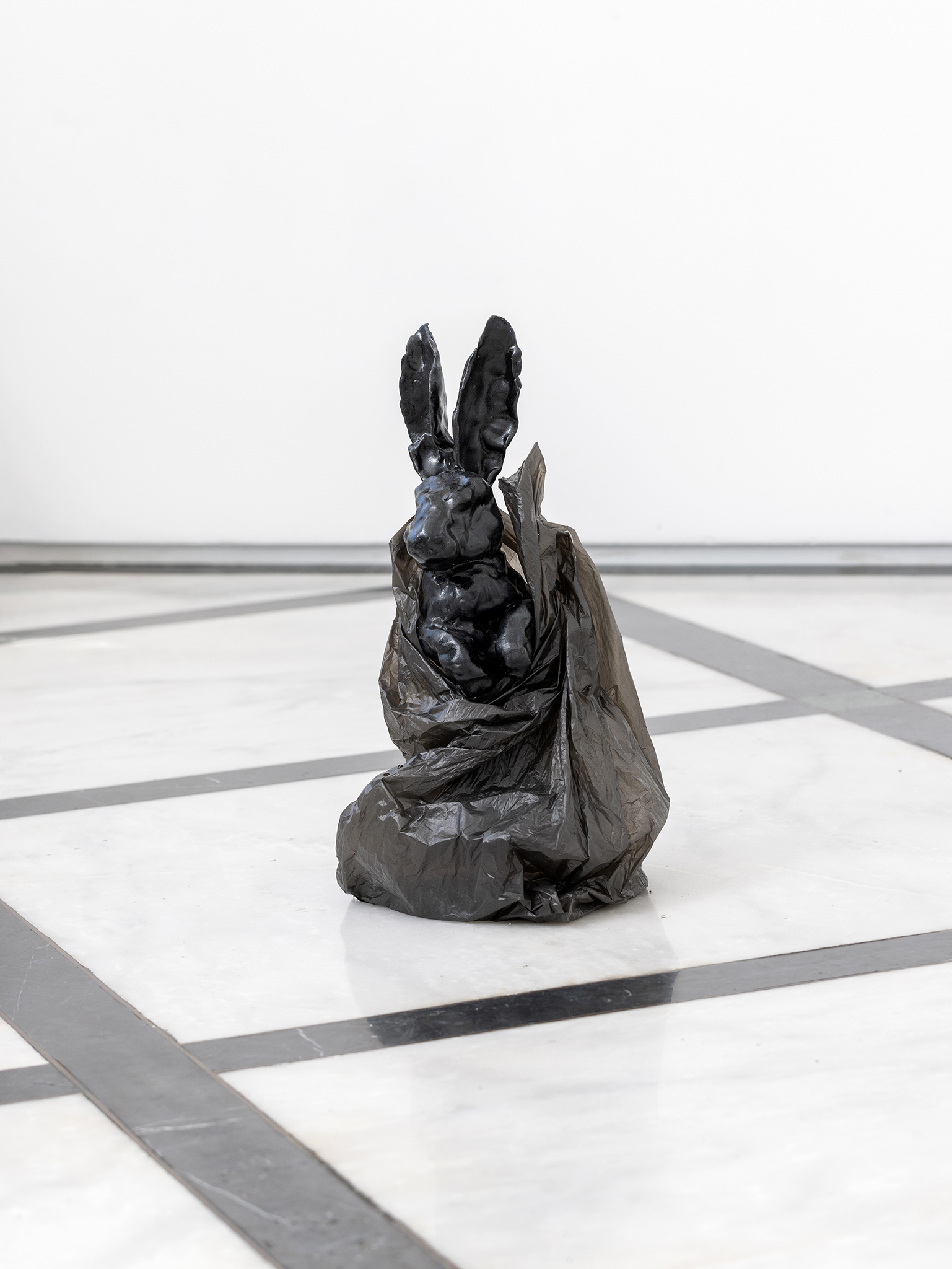Untitled, 2024, stoneware and plastic bag, variable dimensions