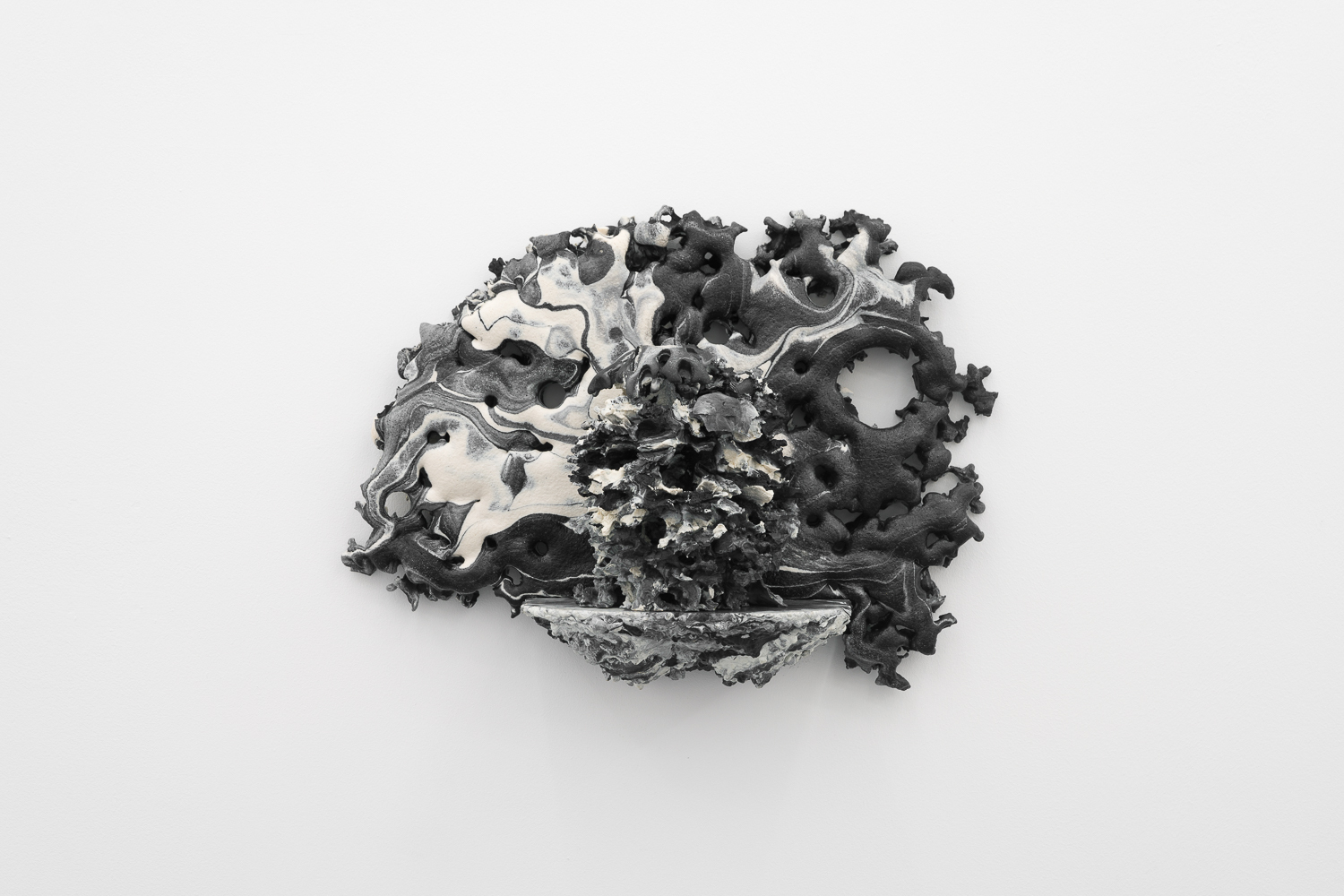Andrew Sabin, Stepping Out (Liquorice), 2024 Pigmented polyurethane and concrete 43 x 55 x 22 cm