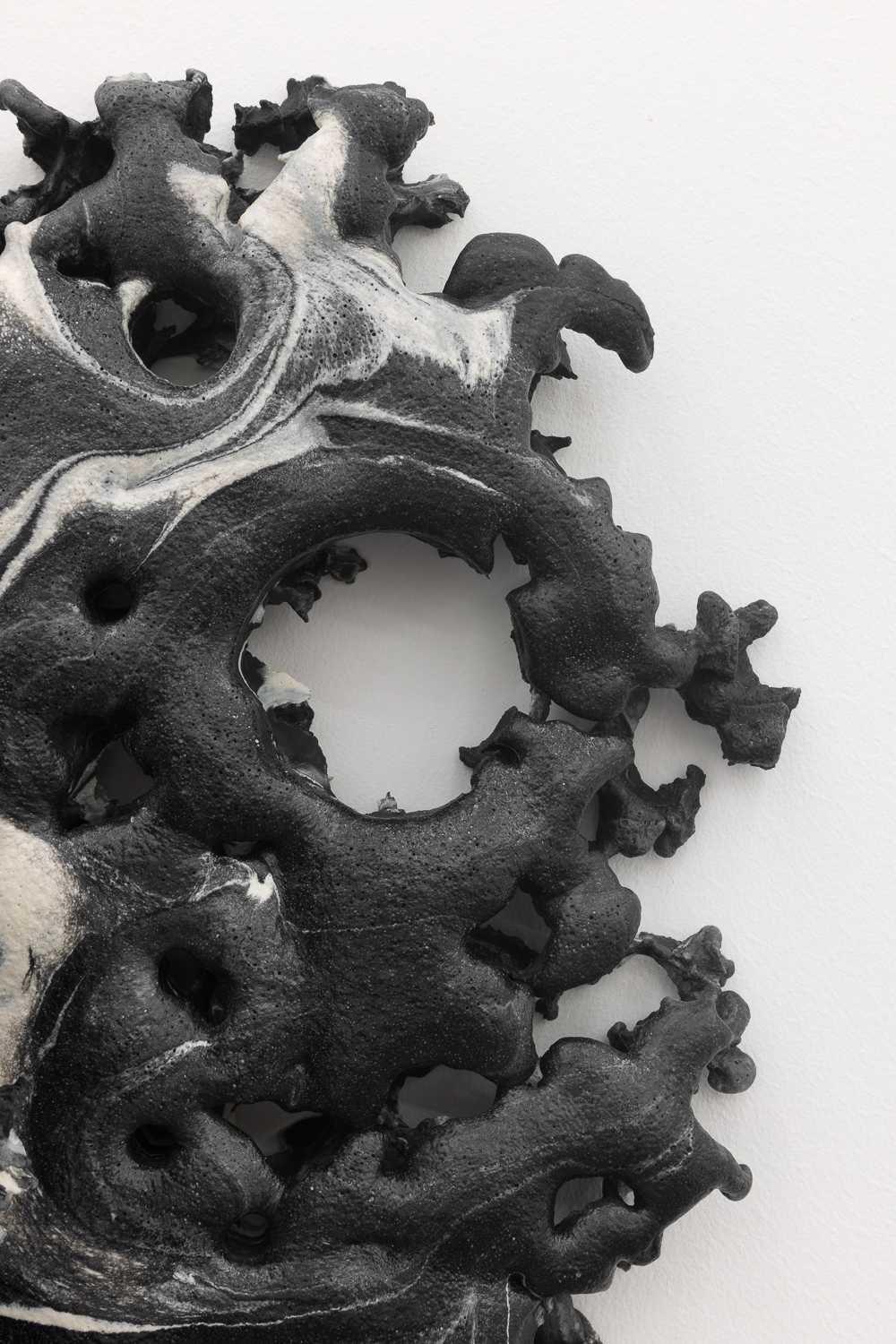 Andrew Sabin, Stepping Out (Liquorice), 2024 Pigmented polyurethane and concrete 43 x 55 x 22 cm