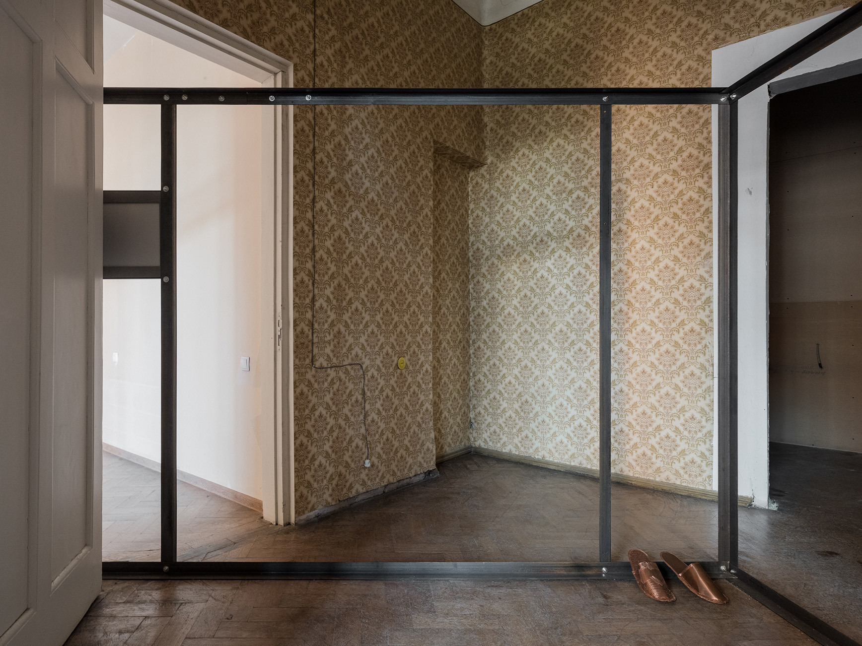 Lado Lomitashvili, 20 m2 , 2024, Iron corners, bolts and screws, 400 x 500 x 200 cm, Slippers, 2022, Copper sheet, copper rivets, 30 x 10 x 4 cm each