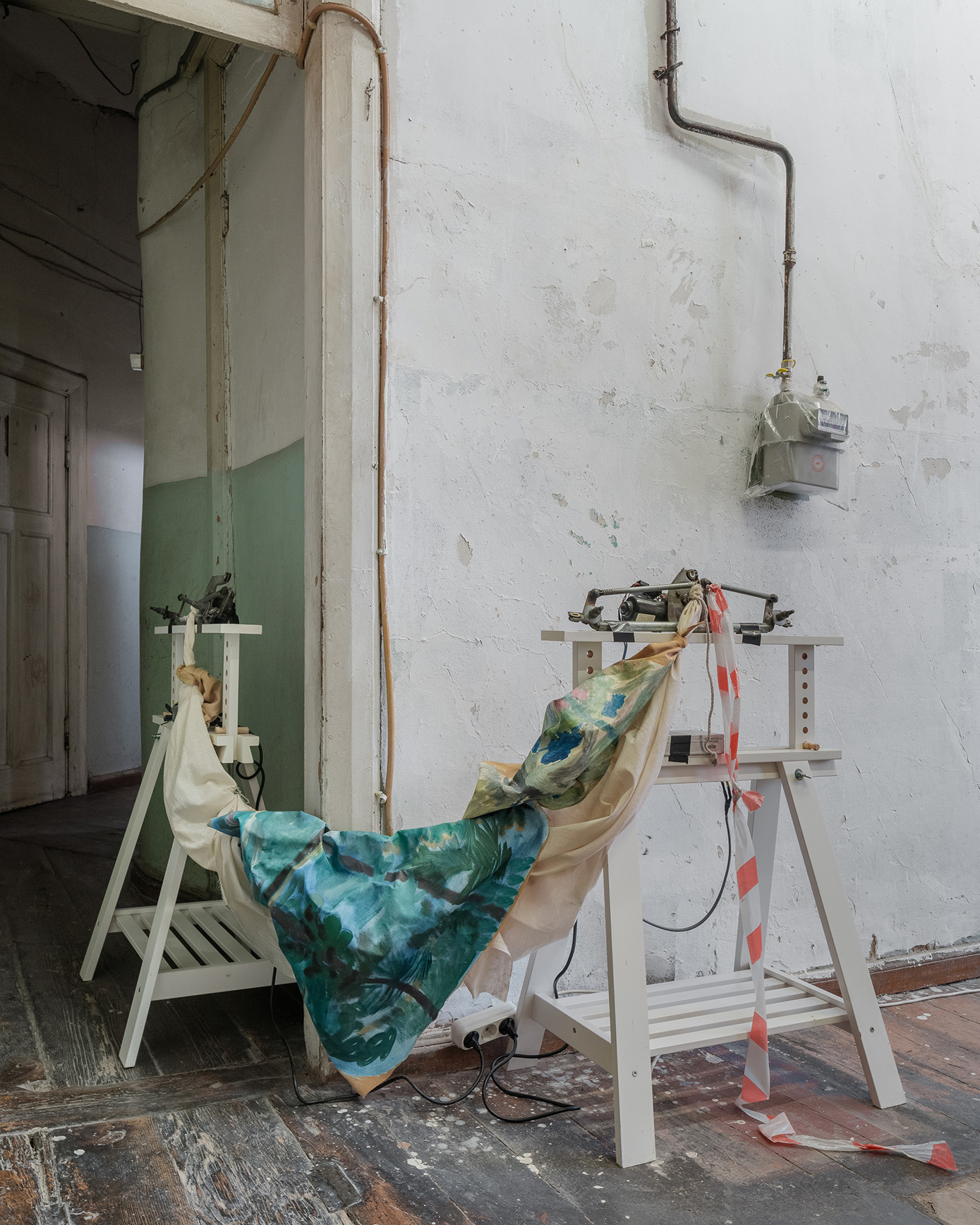 Salome Dumbadze, Finite beings, 2024, IKEA table legs, car windscreen wipers, paintings, Size varies