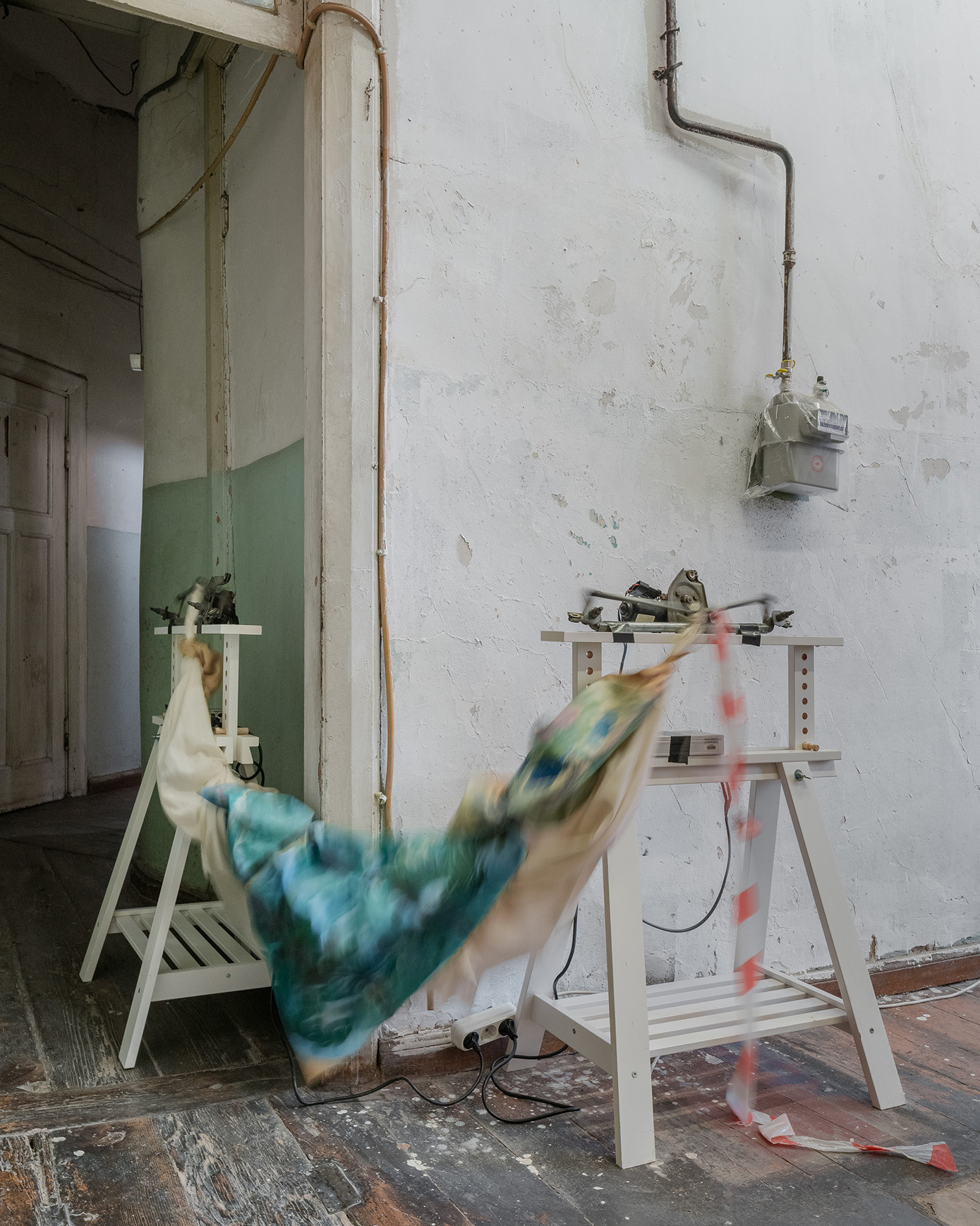 Salome Dumbadze, Finite beings, 2024, IKEA table legs, car windscreen wipers, paintings, Size varies