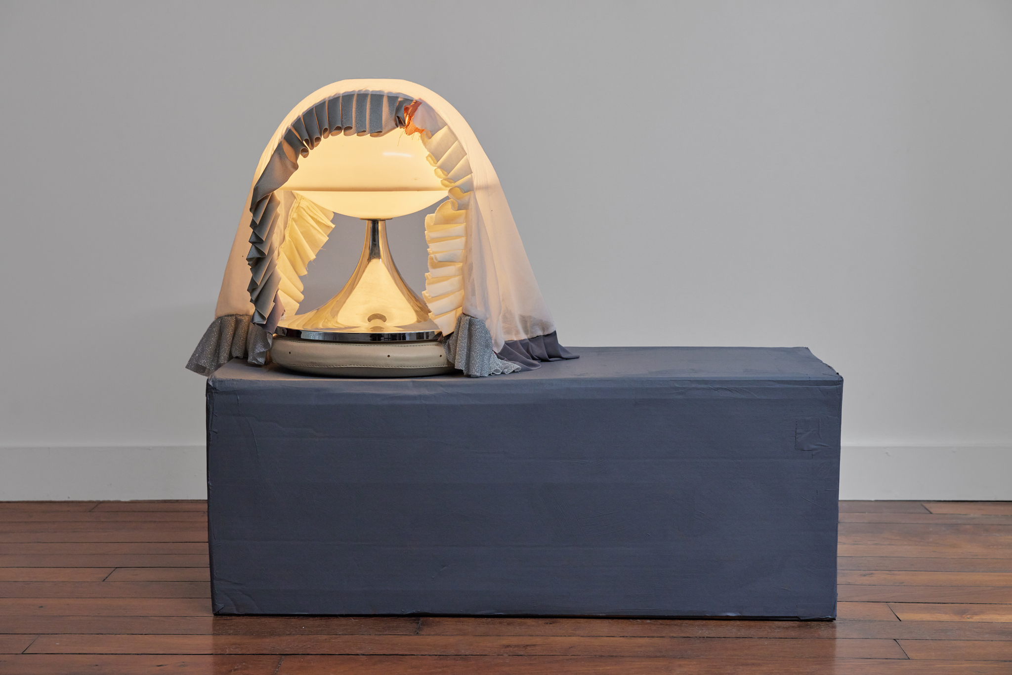 Jessi Reaves, The past is rubble, 2023, Metal, acrylic, leather, fabric, lamp, wiring and hardware, 48 × 40 × 40 cm. Courtesy of the artist and Crèvecœur, Paris. Photo: Alex Kostromin.