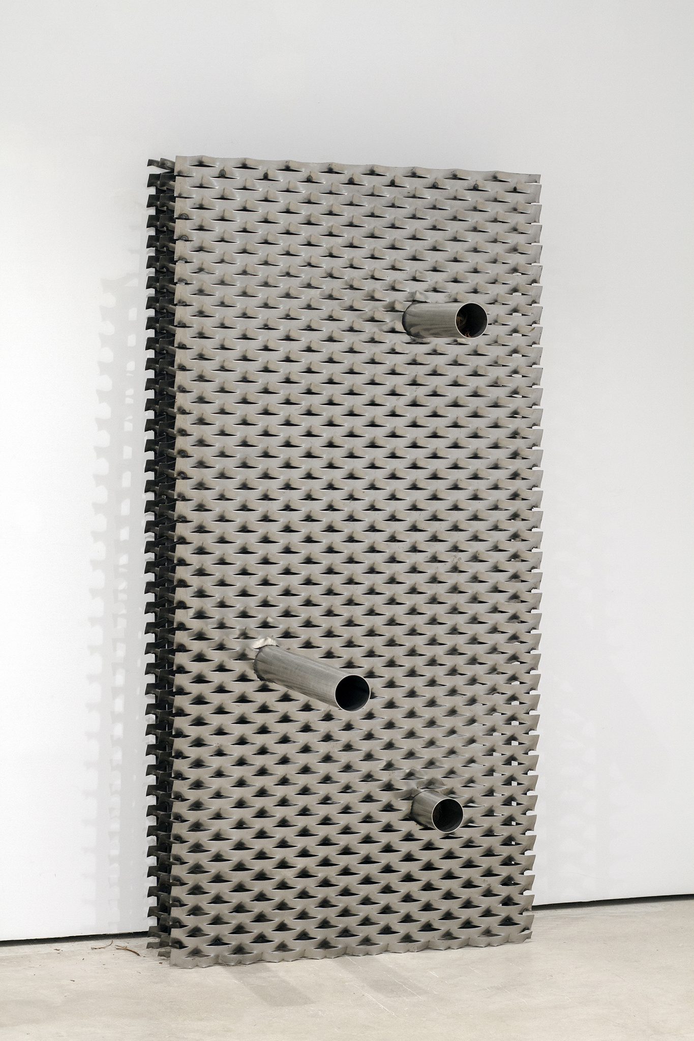 Untitled (intruder), 2024 Deployed carbon steel, stainless steel pipes, hemp, jute, branches and dried plants. 200 x 100 x 110 cm