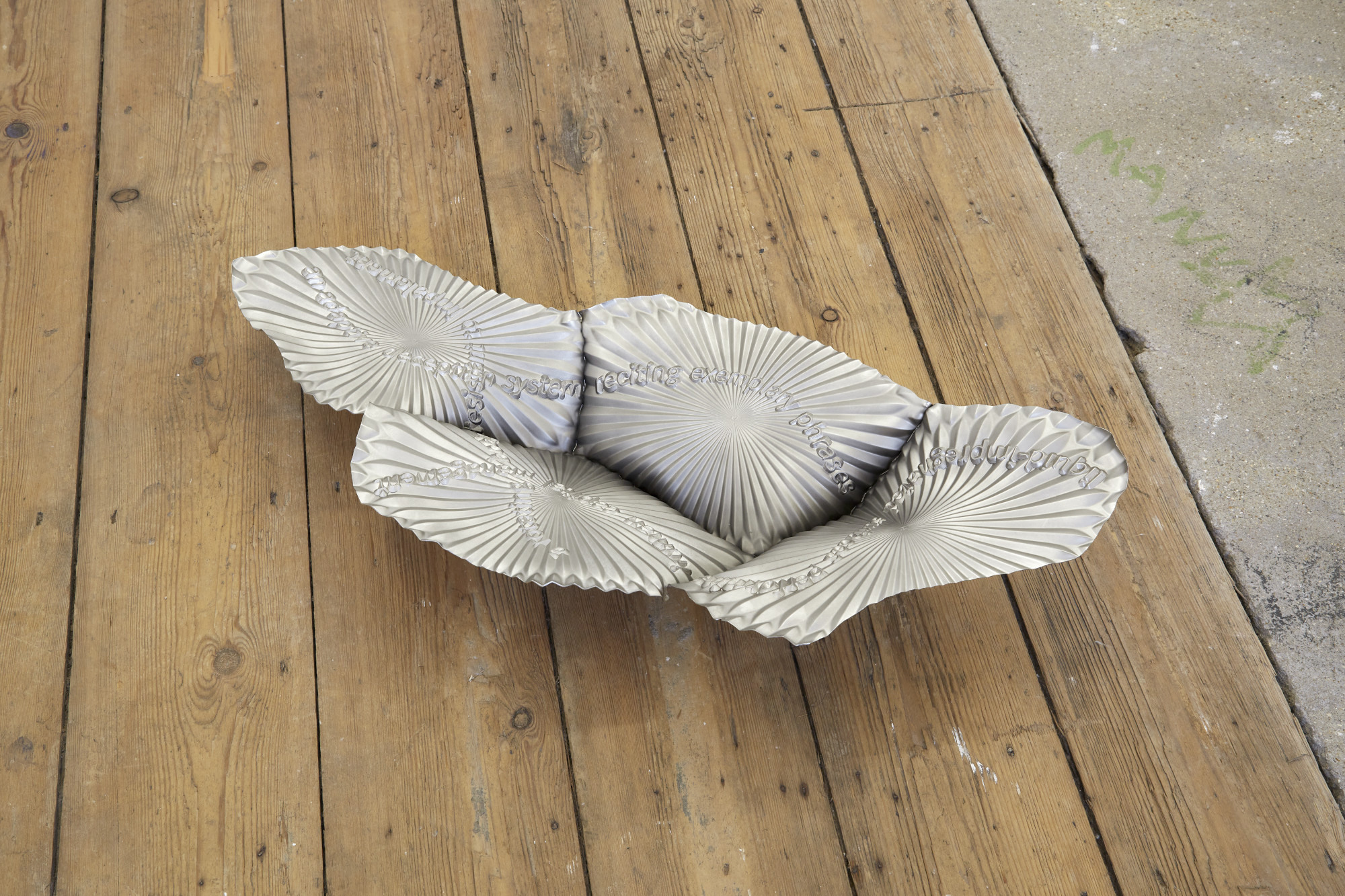 James Fuller, Slow scroller (an adaptive deception system), 2024. Nickel plated copper. 70(L) x 30(W) x 14(D) cm