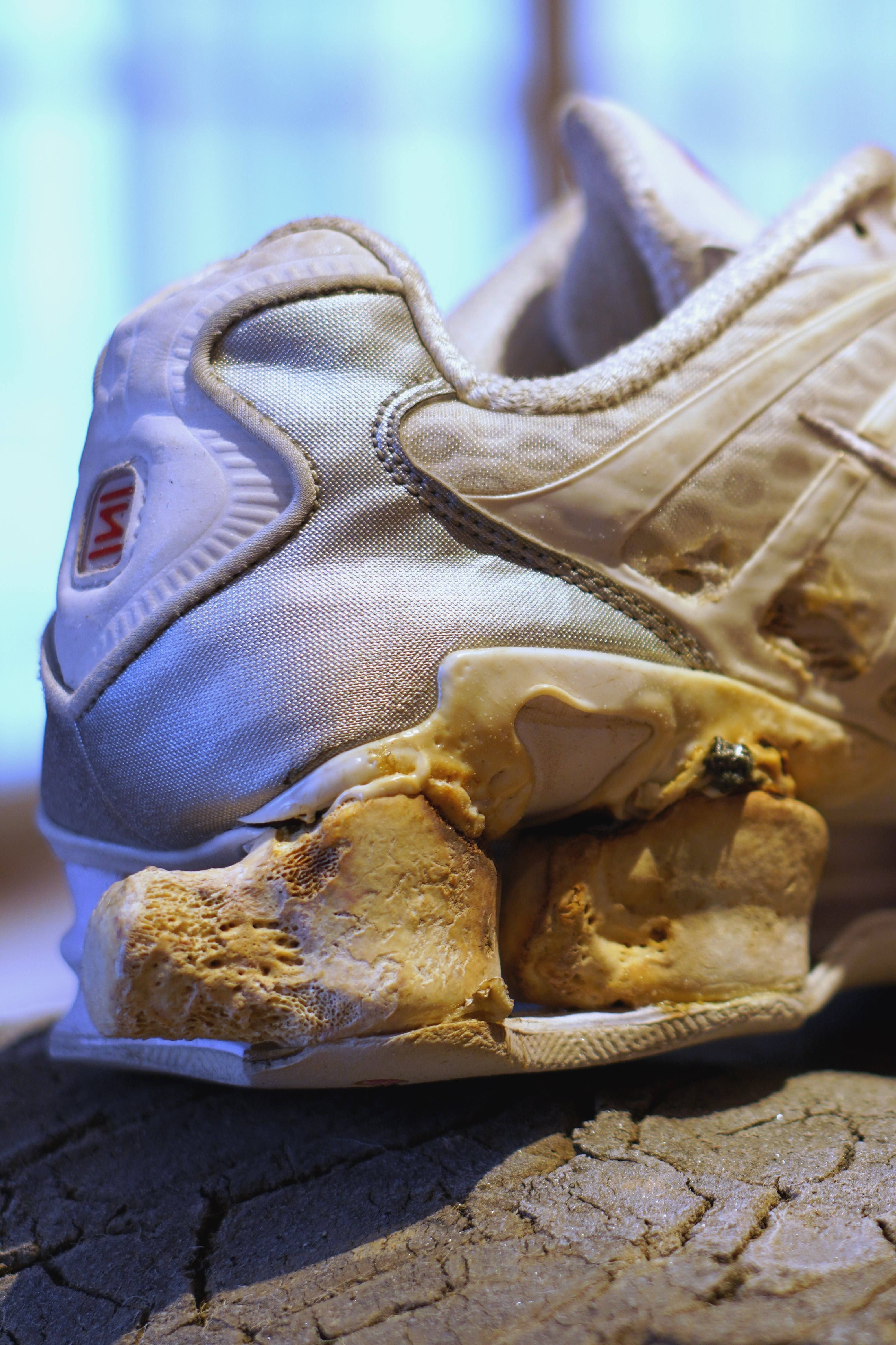 Marek Wodzisławski, bionic objects, Nike Shox with a platform from human bones, asphalt, 2024