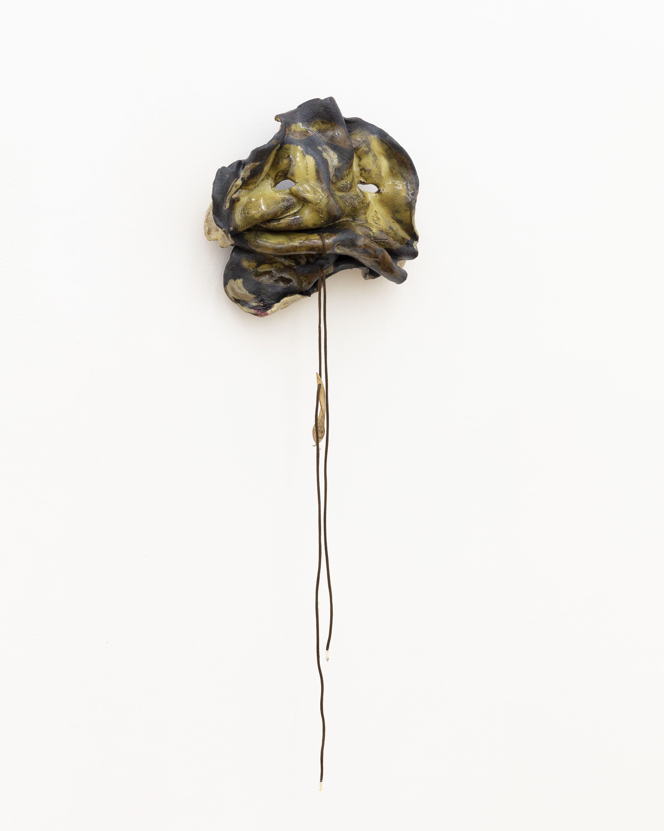 Anousha Payne, Young Snake, 2024, glazed ceramic stoneware, string, found plastic, bronze, approx. 30 x 35 x 15 cm