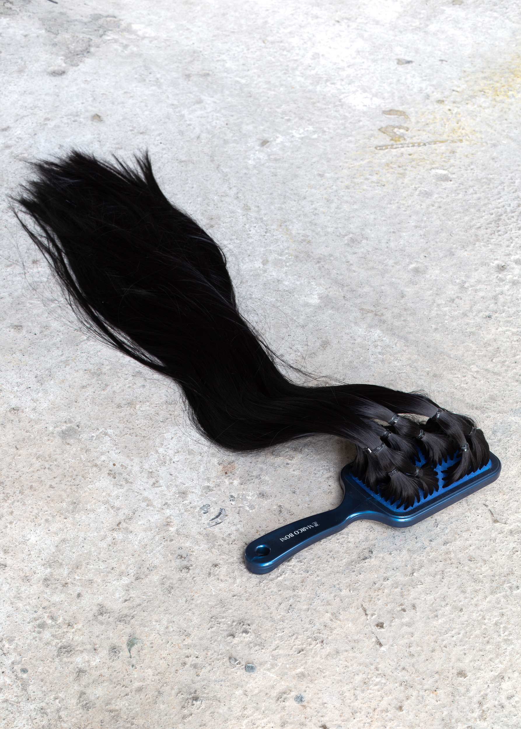 "Pichara" by Agustina Jarpa. Comb and hair, 2024