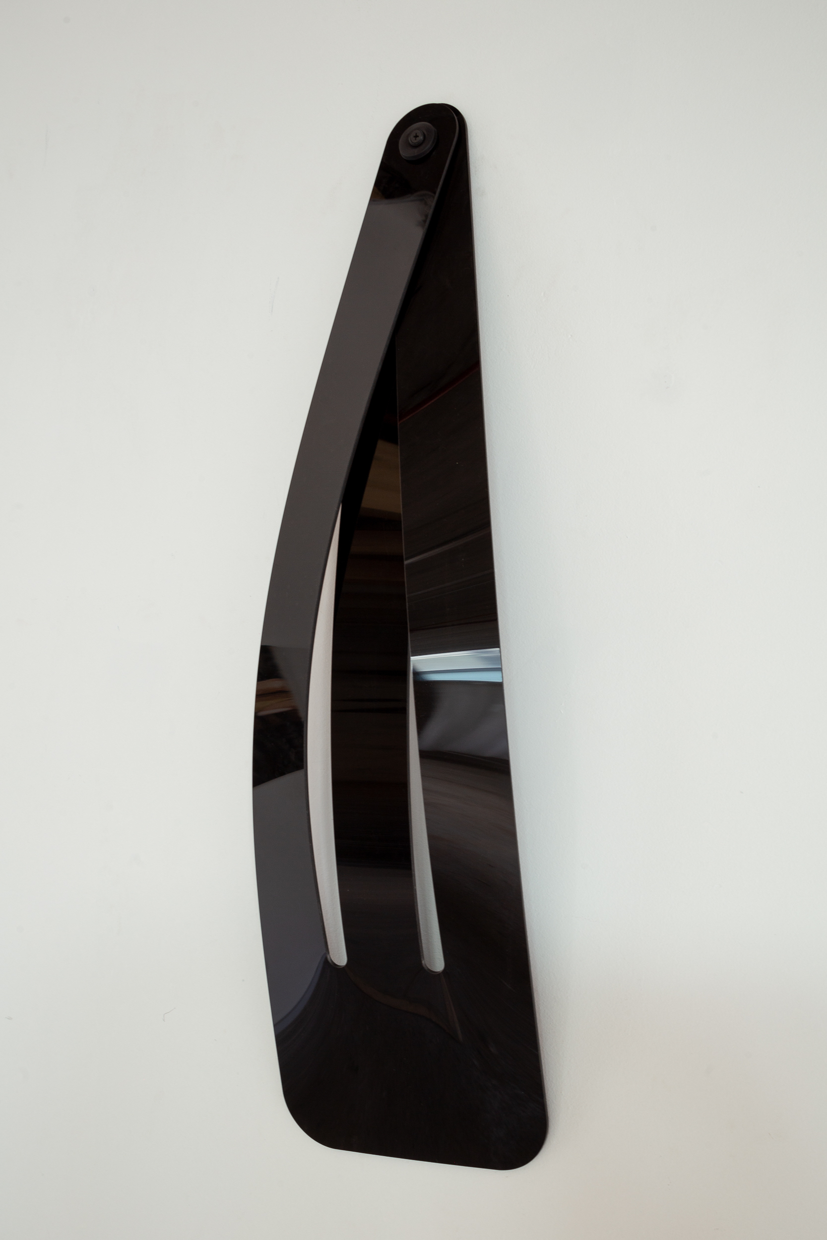 "Clip" by Agustina Jarpa. Black acrylic, 70 x 25 cm, 2024