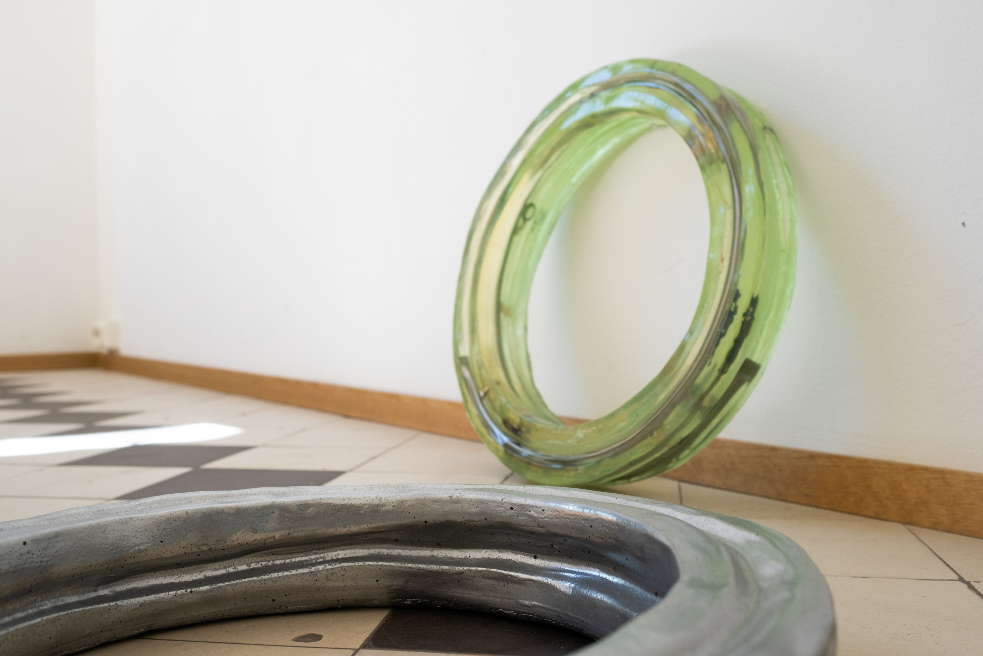 Eeva Juuti. circuit of light (series), 2024, concrete, spray paint, acrylic paint, pencil, dry pastel, resin, found objects, pigment. Image: Inari Sandell.