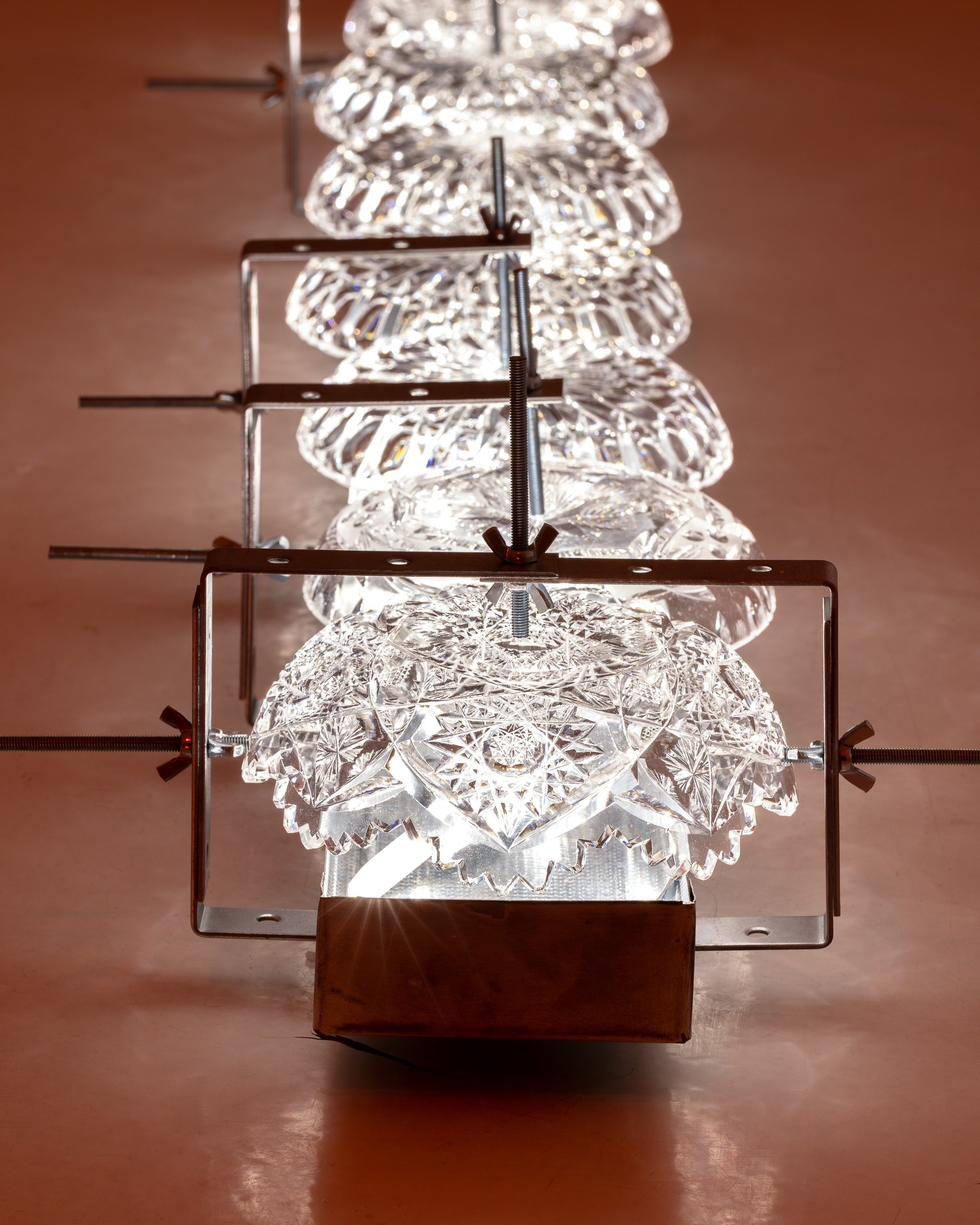 Eternal Engine and Eliza Chojnacka, Peryferal, 2024, crystal glass, aluminium, 1200 x 12 x 20 cm, photo by Szymon Sokolowski
