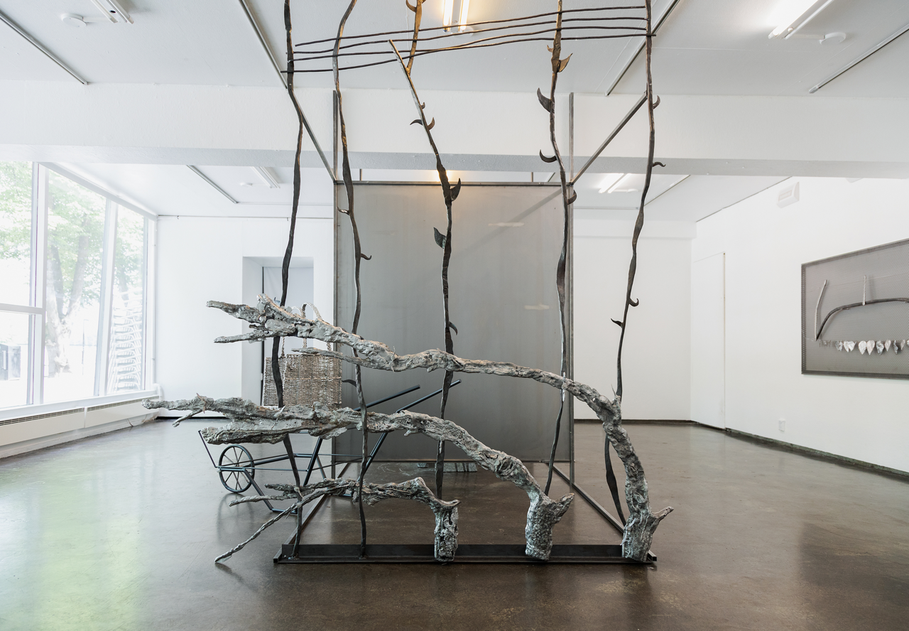 Maija Fox âways that roam usâ installation; casted aluminium, buttercups, forged steel, blue roll