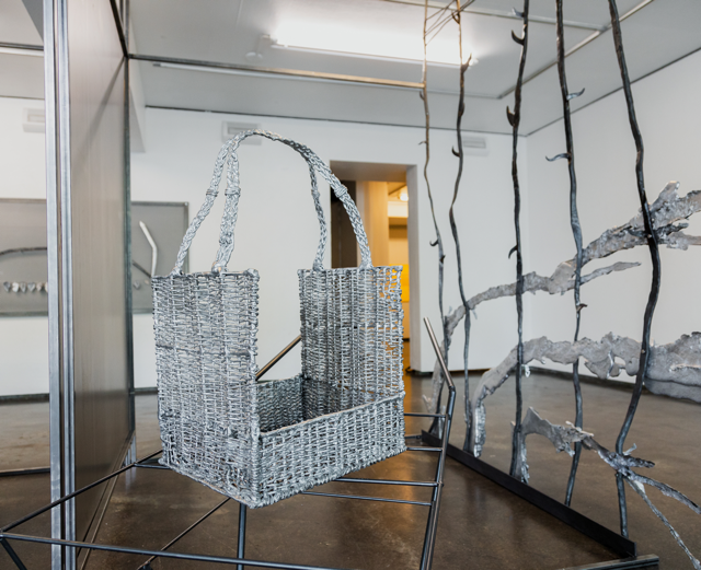 Maija Fox âways that roam usâ installation; casted aluminium, buttercups, forged steel, blue roll