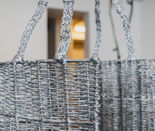 Maija Fox âways that roam usâ installation; casted aluminium, buttercups, forged steel, blue roll