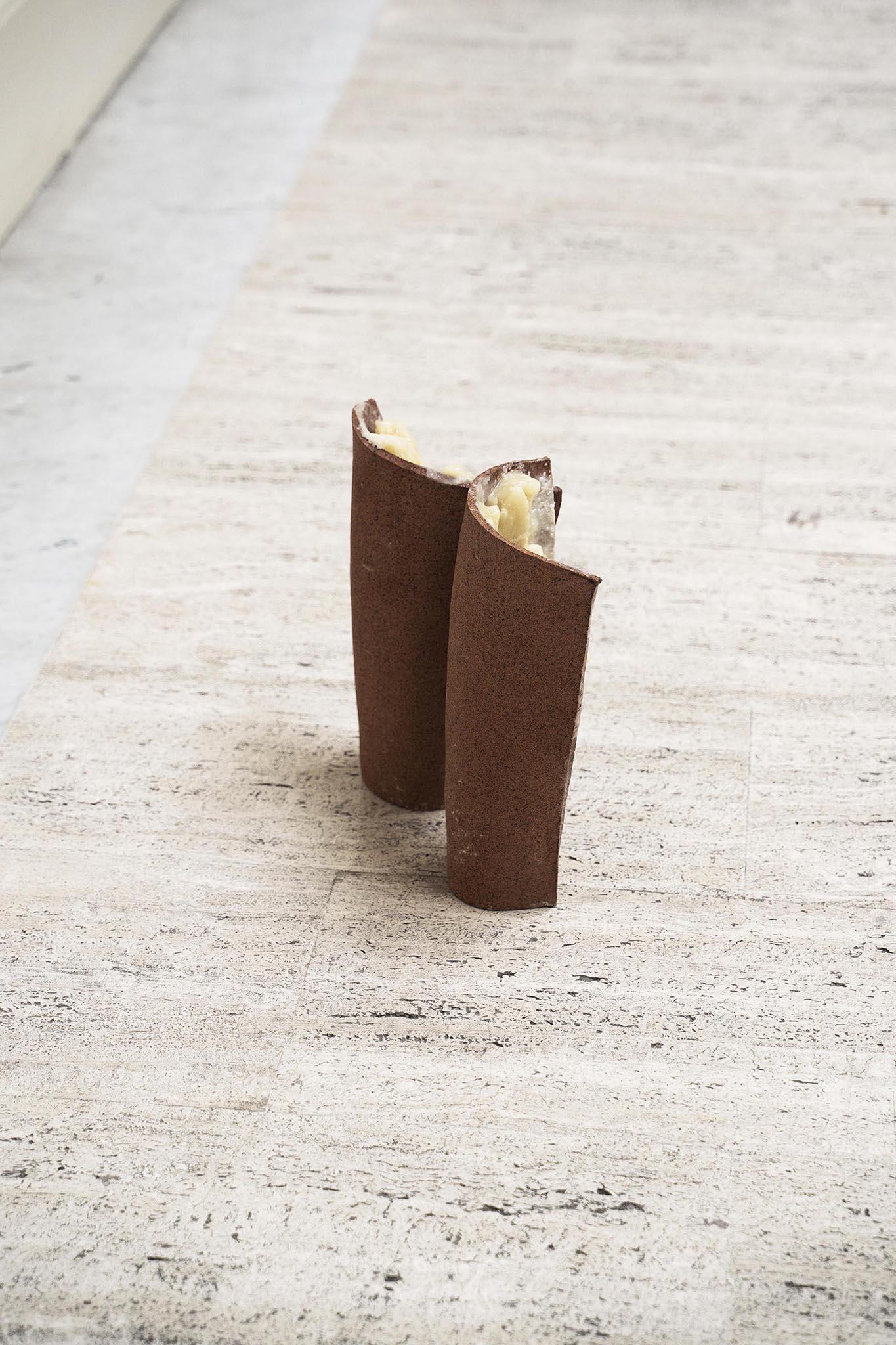 ◡◡, 2024 (detail). High-temperature ceramics fired in oxygen reduction, wax. 30 x 33 x 14 cm