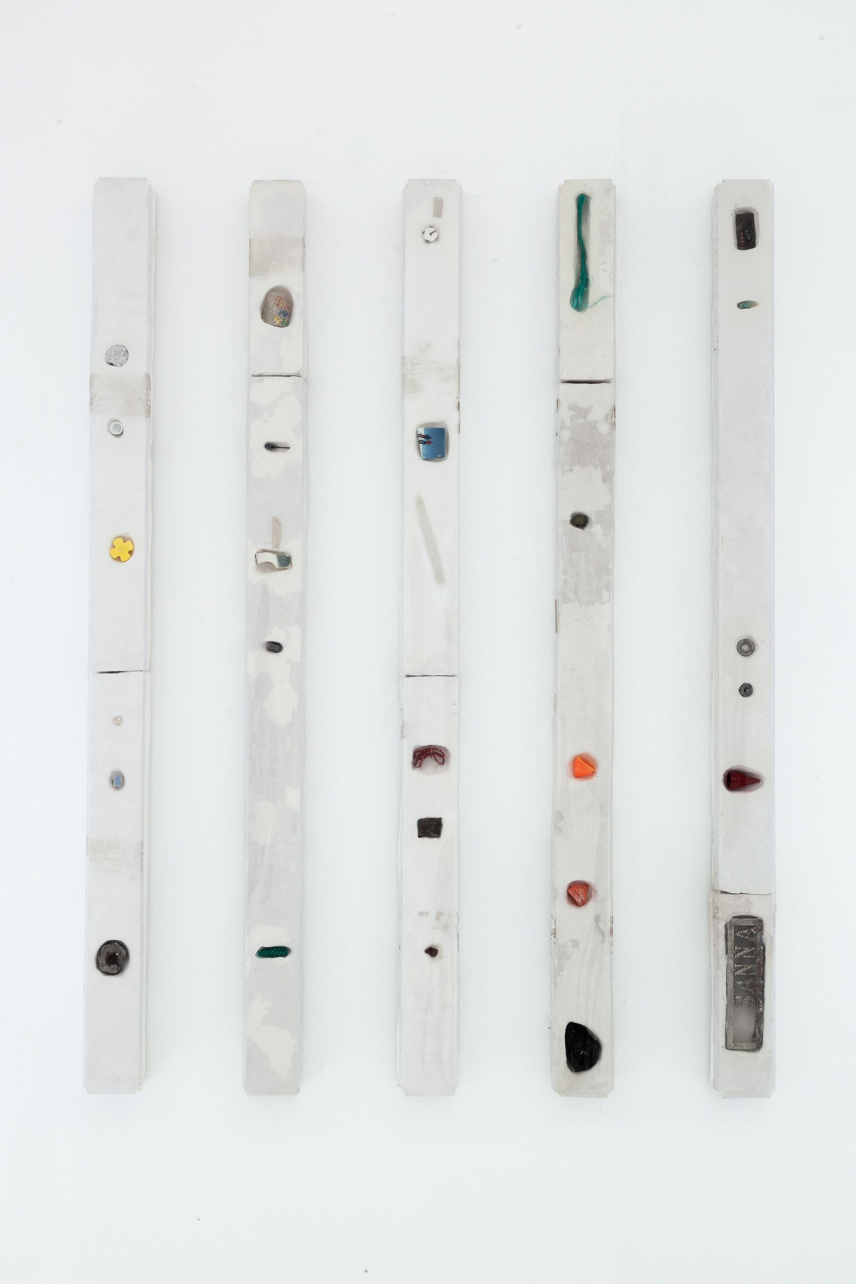 Alexandra Phillips, Specials, 2018, plaster, plastic, found items, foam, 130x8x6cm each