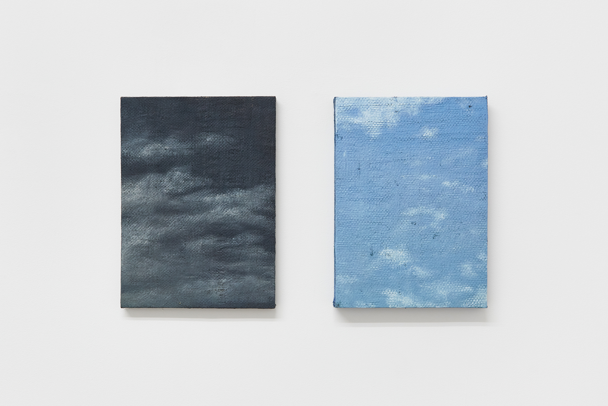 Left: Andrew North, Untitled, 2024. Oil on black coated polypropylene, 35 x 25.5 cm. Right: Andrew North, Untitled, 2024. Oil on blue coated polypropylene, 35 x 25.5 cm