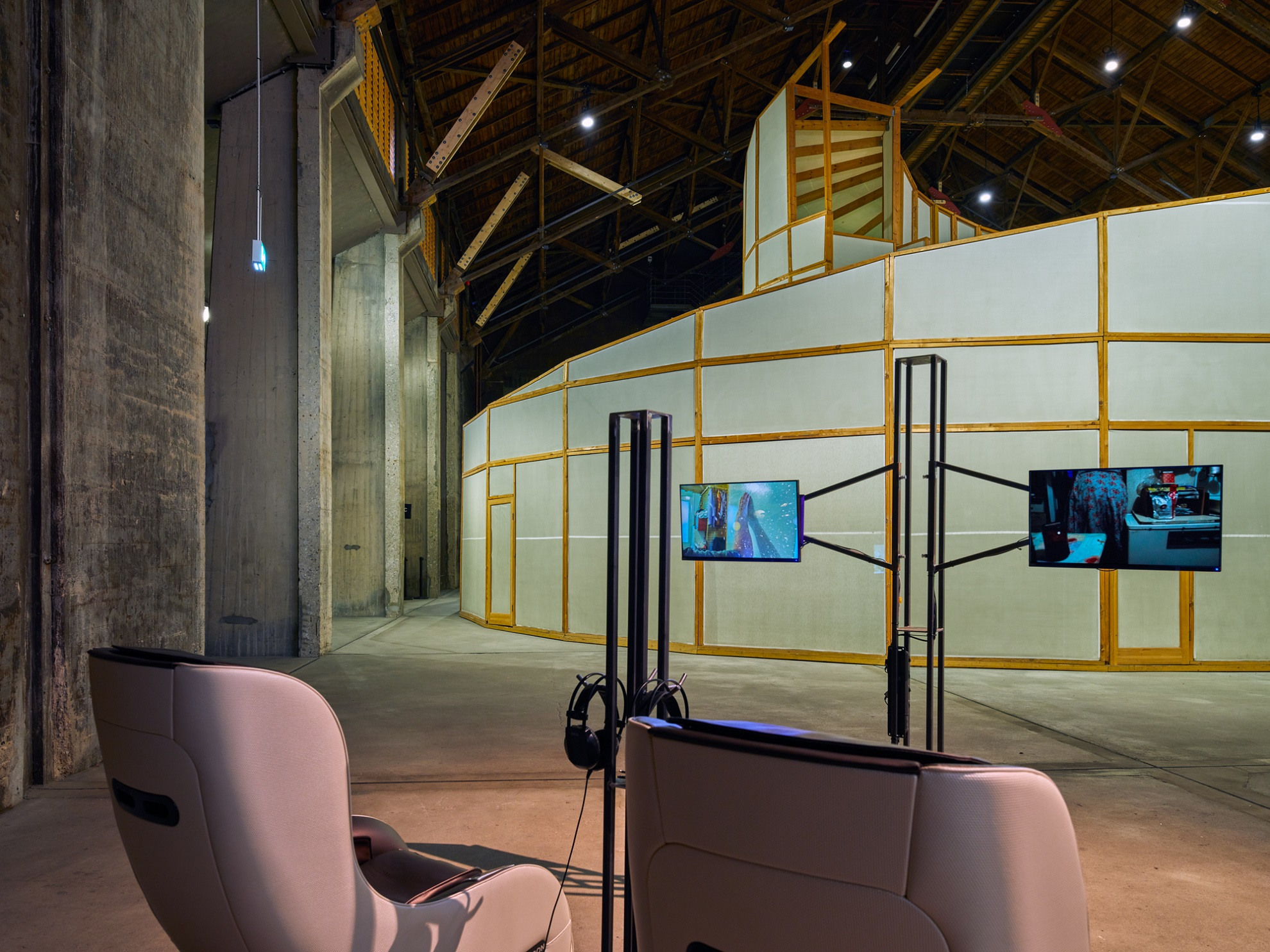 Installation view (Uli Golub, foreground; Ilya & Emilia Kabakov, background). Babushka in Space (2017, foreground), The Palace of Projects (1998, background). Photo: Henning Rogge. Image courtesy of UKR.