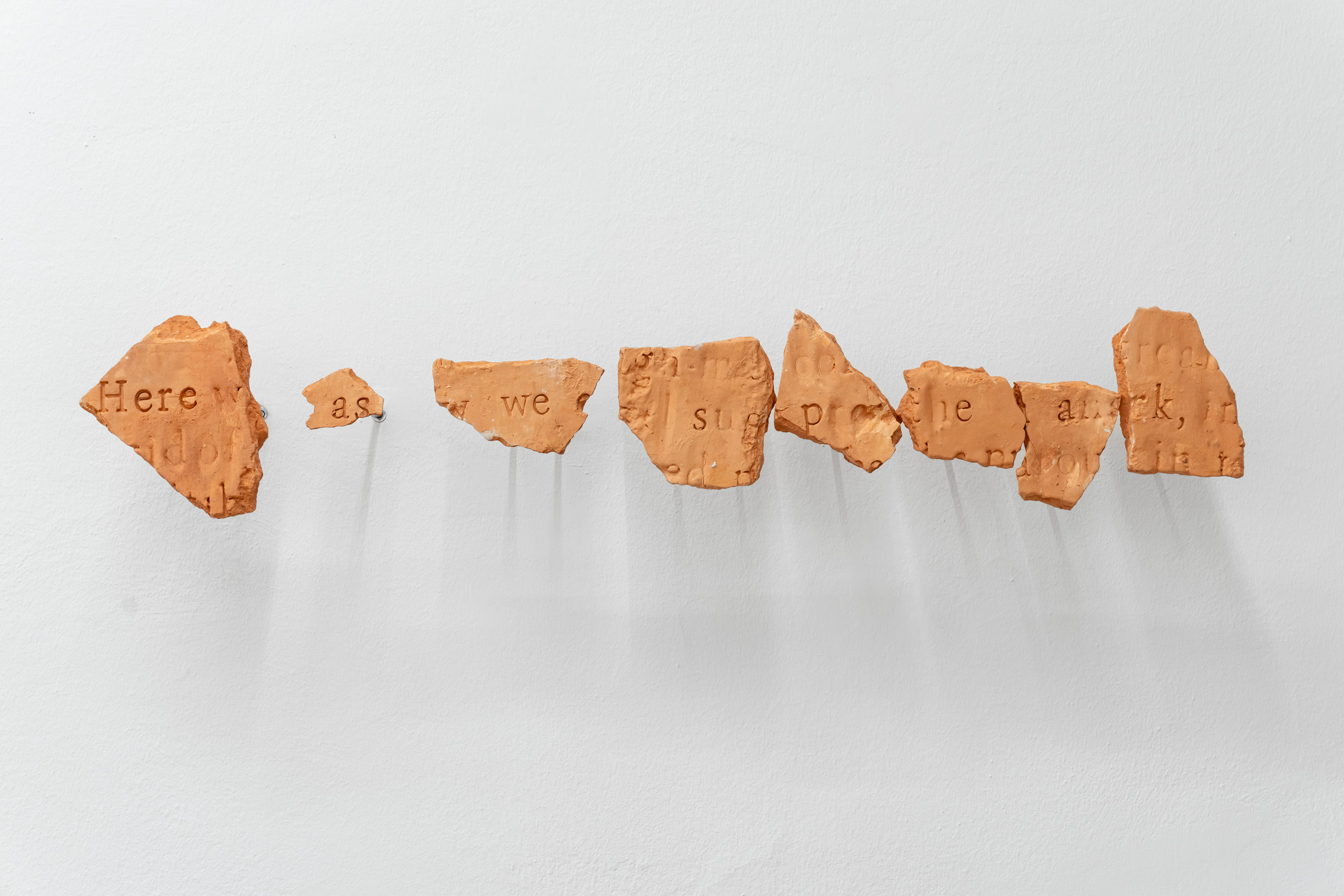 Lennart Lahuis, "MURMUR #14/ Here as we speak", 2018 - 2024, clay and stainless steal, 15 x 50 cm.