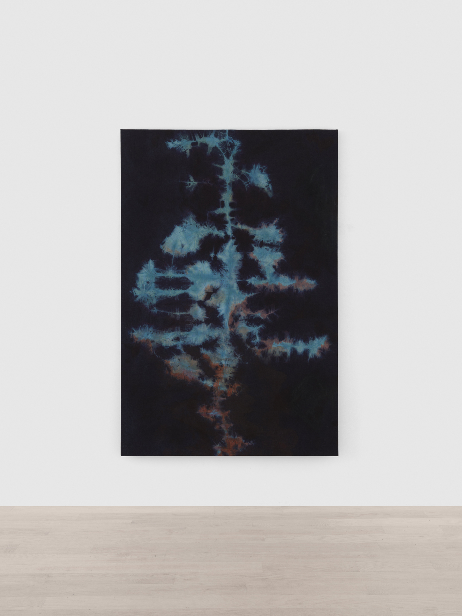 Tahir Karmali, You turned me into a weapon I cannot control, 2024, Indigo dyed denim, cocaine, bleach, thiox, red and black dye, milk, charcoal, and fixative, 72 x 48 inches / 182.9 x 122 cm