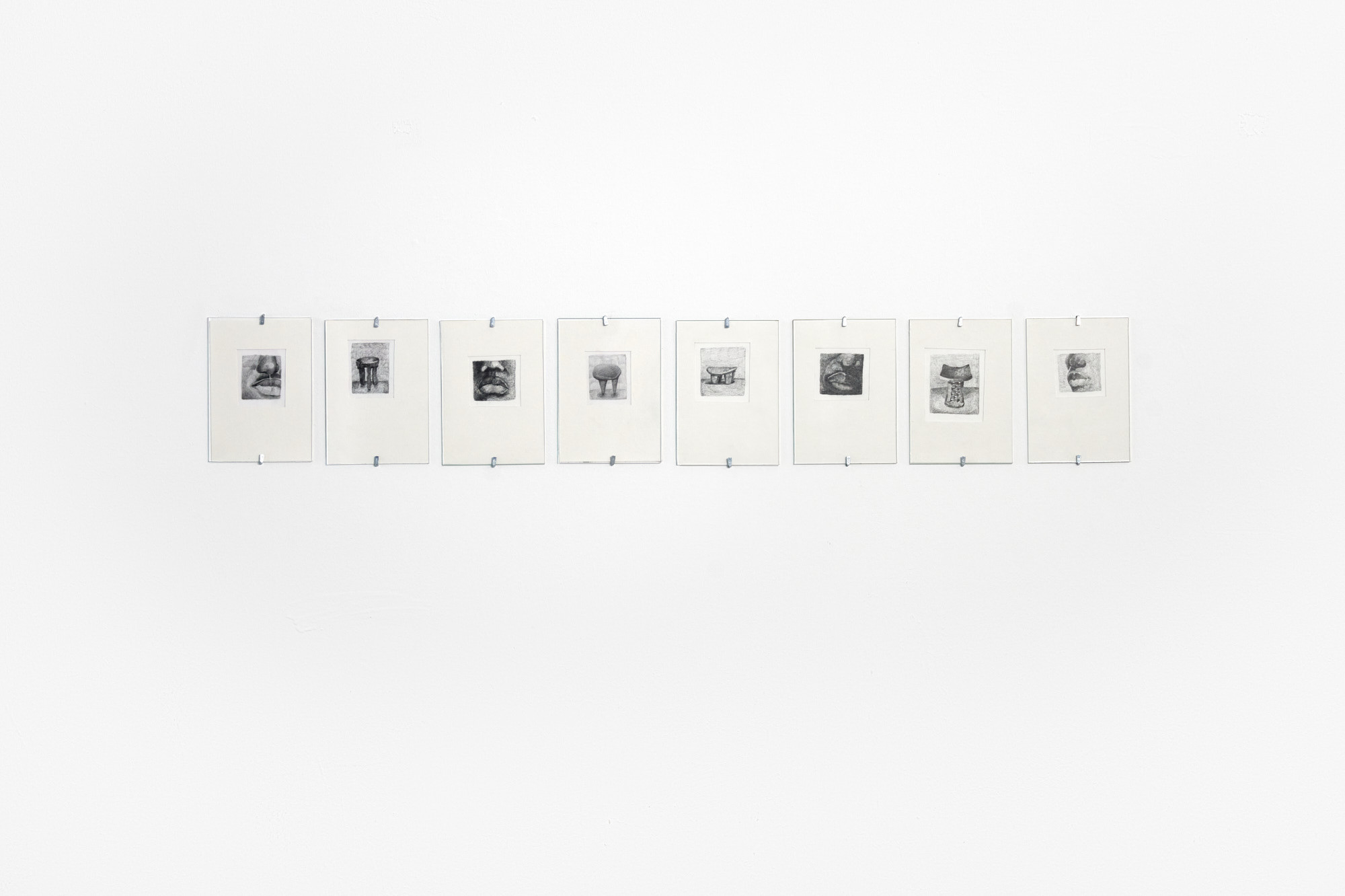 Clémence Appie Gbonon, Faces and stools, 2023, 8 drawings, graphite on paper, each 14,8 x 10,5 cm