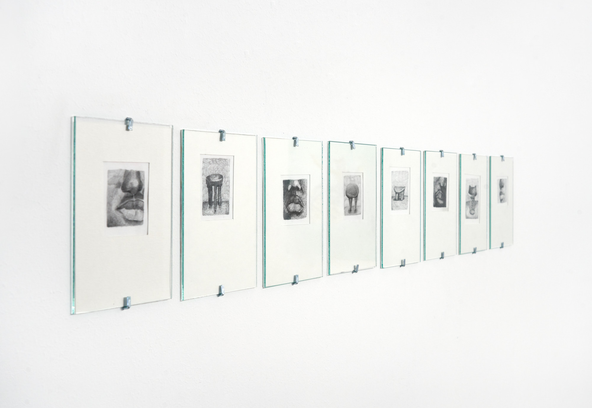 Clémence Appie Gbonon, Faces and stools, 2023, 8 drawings, graphite on paper, each 14,8 x 10,5 cm