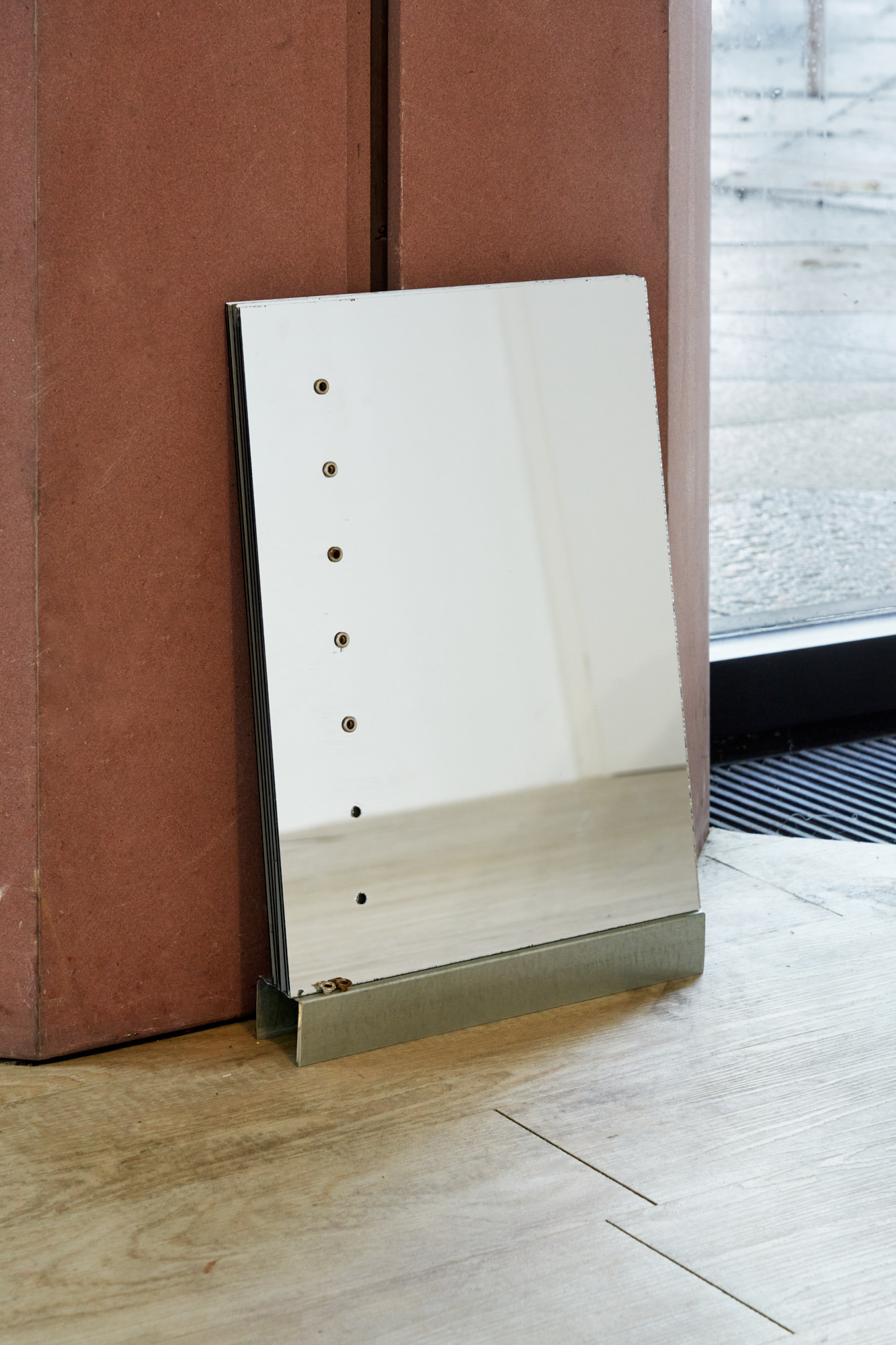 Nina Nadig, Untitled (updown_updown), 2023, Mirror, eyelets, aluminium, Dimensions variable