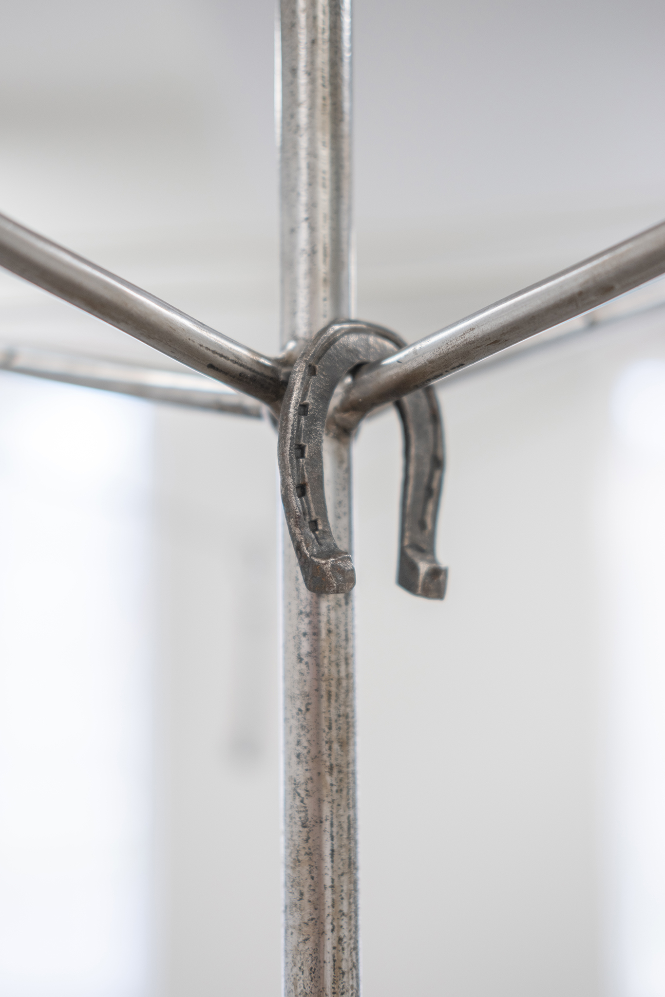 "Drying Rack", 190x88x90 cm, steel, plastic rope, concrete, fresco, 2024 / Eeva Lietonen