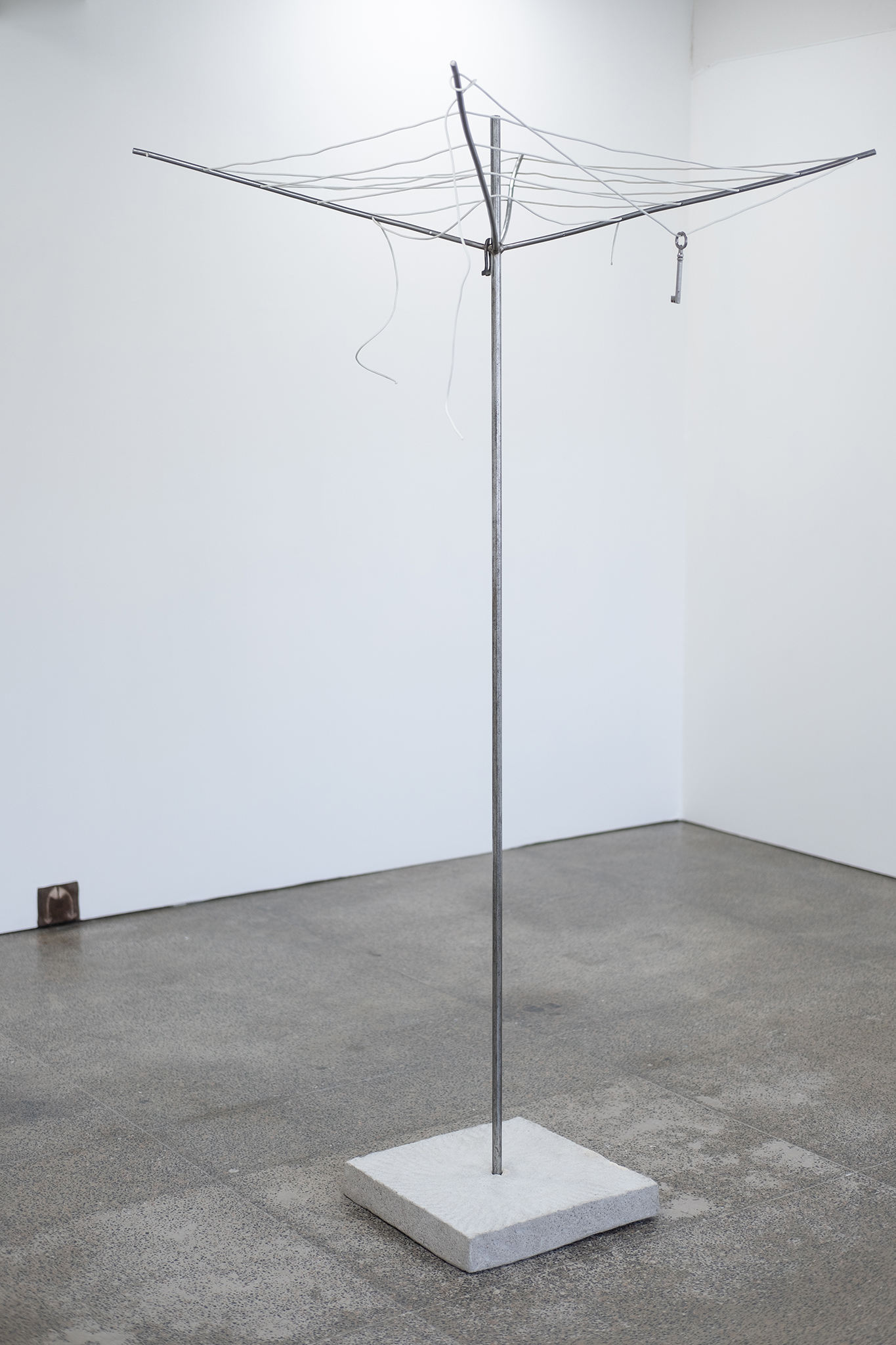 On the wall: "Encounter at Dusk", 11x12 cm, fresco, 2024 / Eeva Lietonen On the floor: "Drying Rack", 190x88x90 cm, steel, plastic rope, concrete, fresco, 2024 / Eeva Lietonen