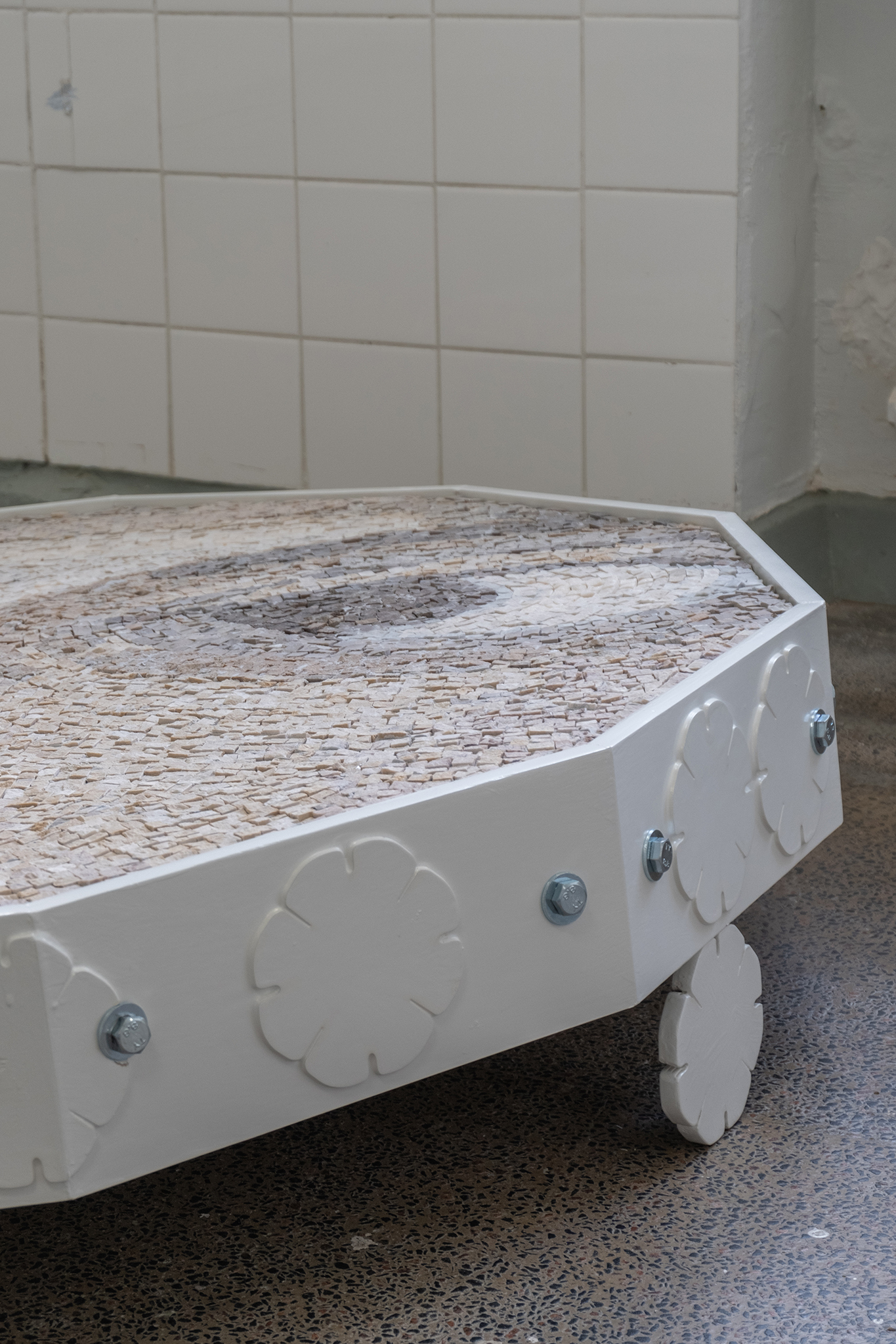 "Lost in the field of wild daisies", marble, bolts, painted mdf, 2024 / Riikka Anttonen