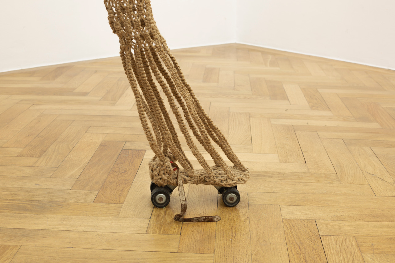 Maddy Arkesteyn, Untitled (from the series: Brancusiâs Psychosis Goes Exotic), 2010, MacramĂ© (knotted rope), roller skate, stool, trolley, wire, 133 Ă 115 Ă 2 cm