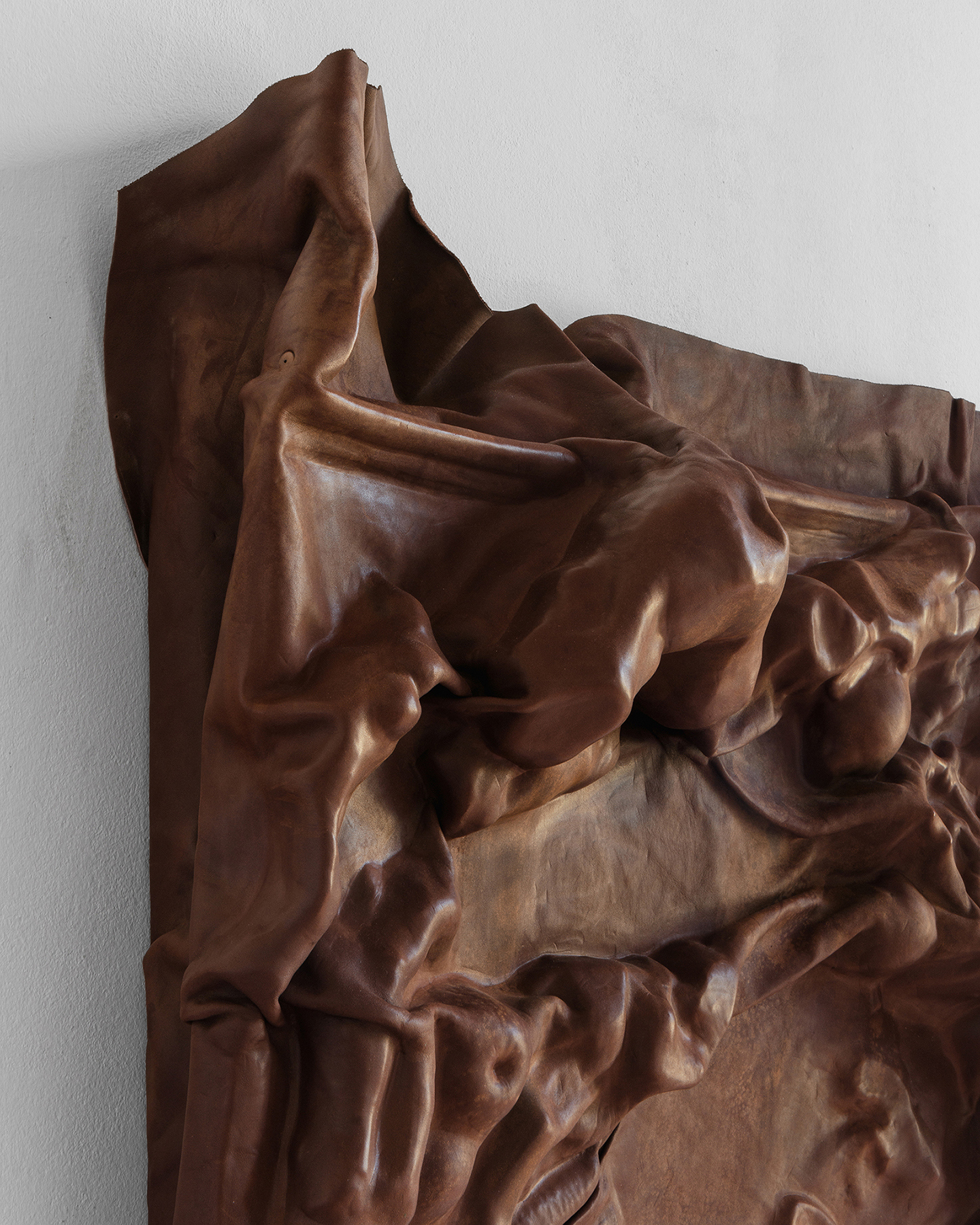 Detail from Ana Gzirishvili, Flighty Trails, 2024, Leather Cast, Wood, 85x135x22 cm