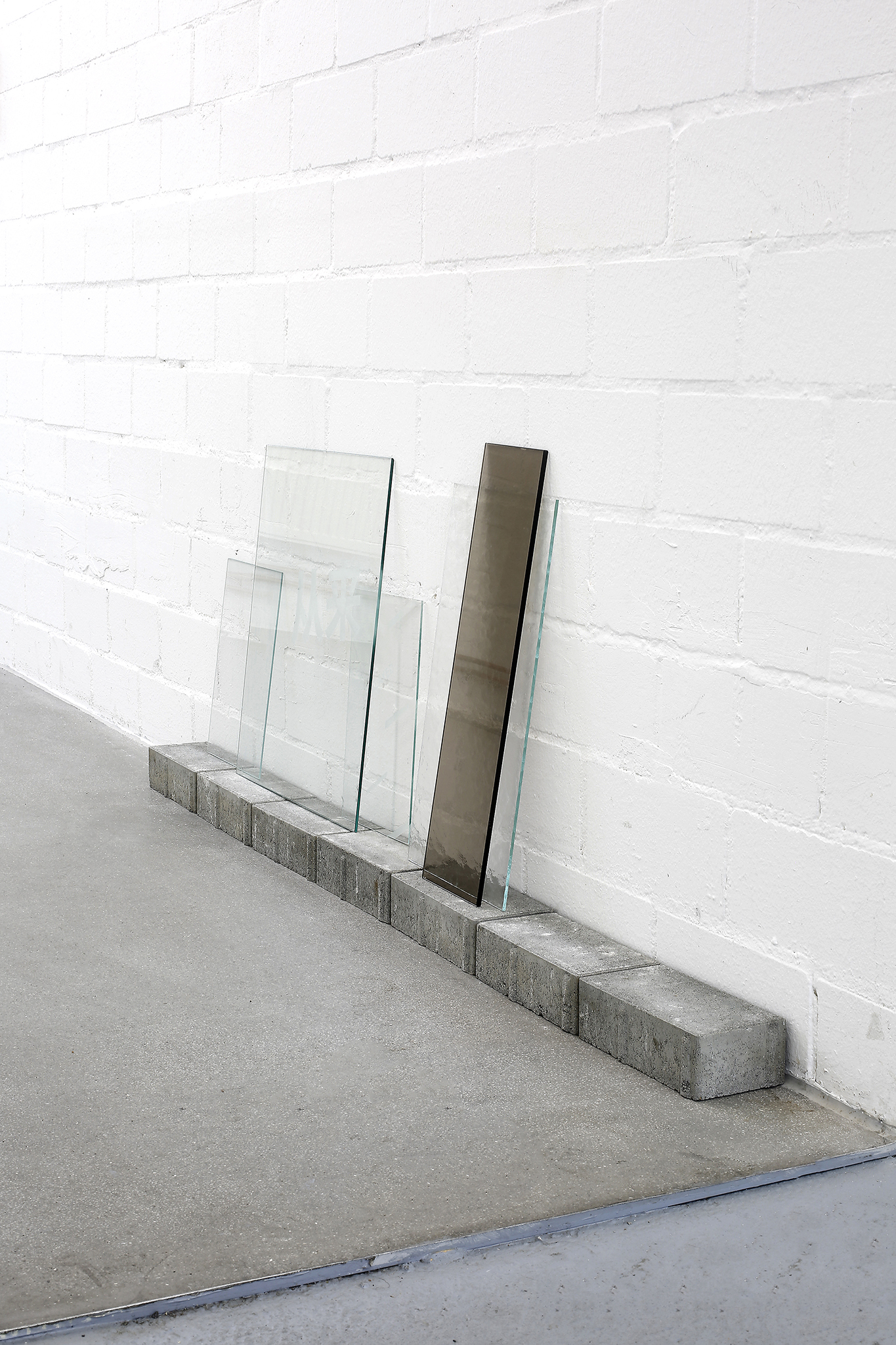 Anna Mészáros: vit 1, vit 2 (The Glass Pieces), 2021-24. engravings, glass, pavement stones