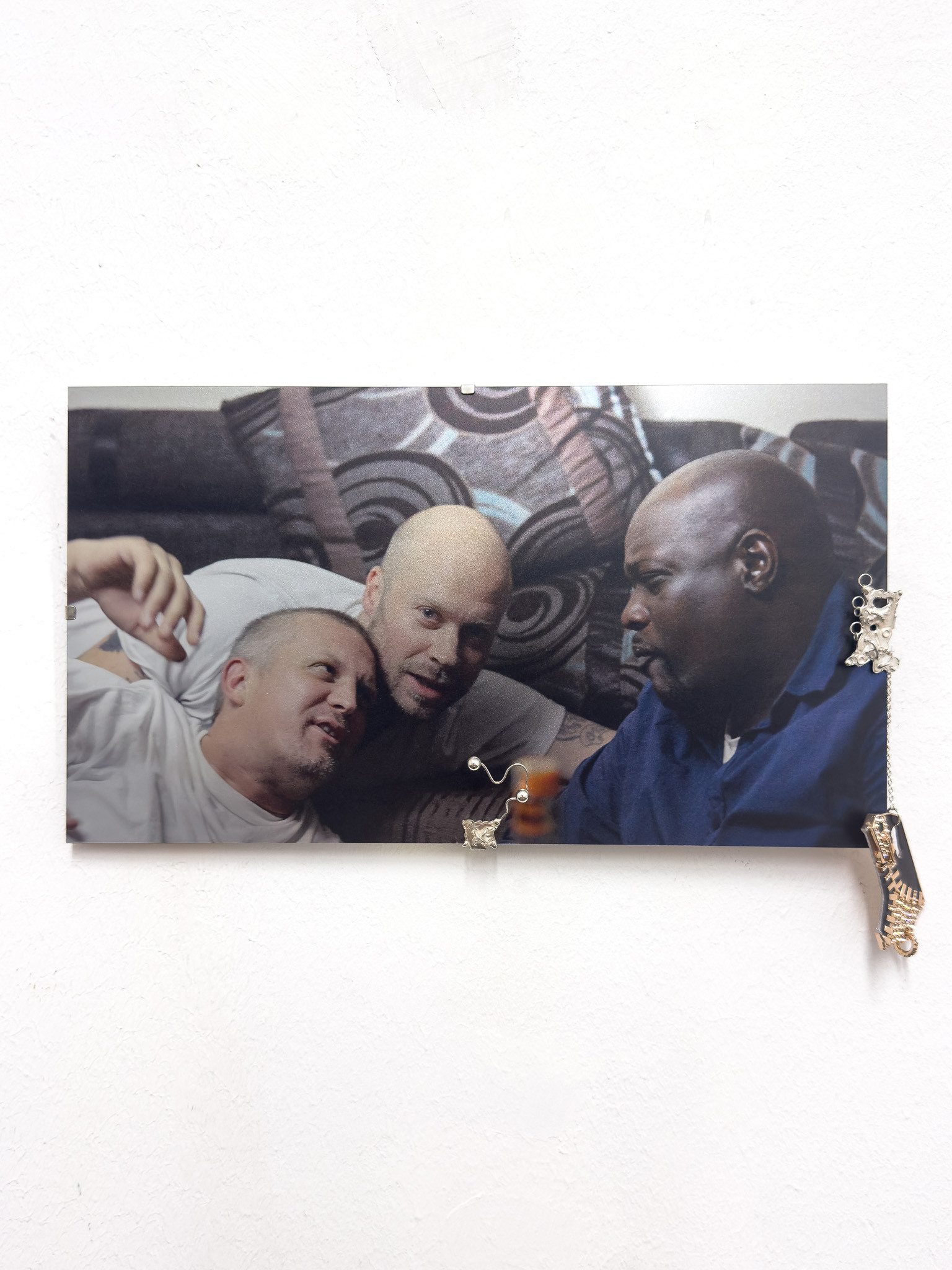 Daniel Hopp with  Hellena Hueck,  Bought With Pleasure IV, 2024, sterling silver, cubic zirconia, repurposed pendant, spring steel, cardboard, metal print, 16,8 x 30cm, Sprink Düsseldorf