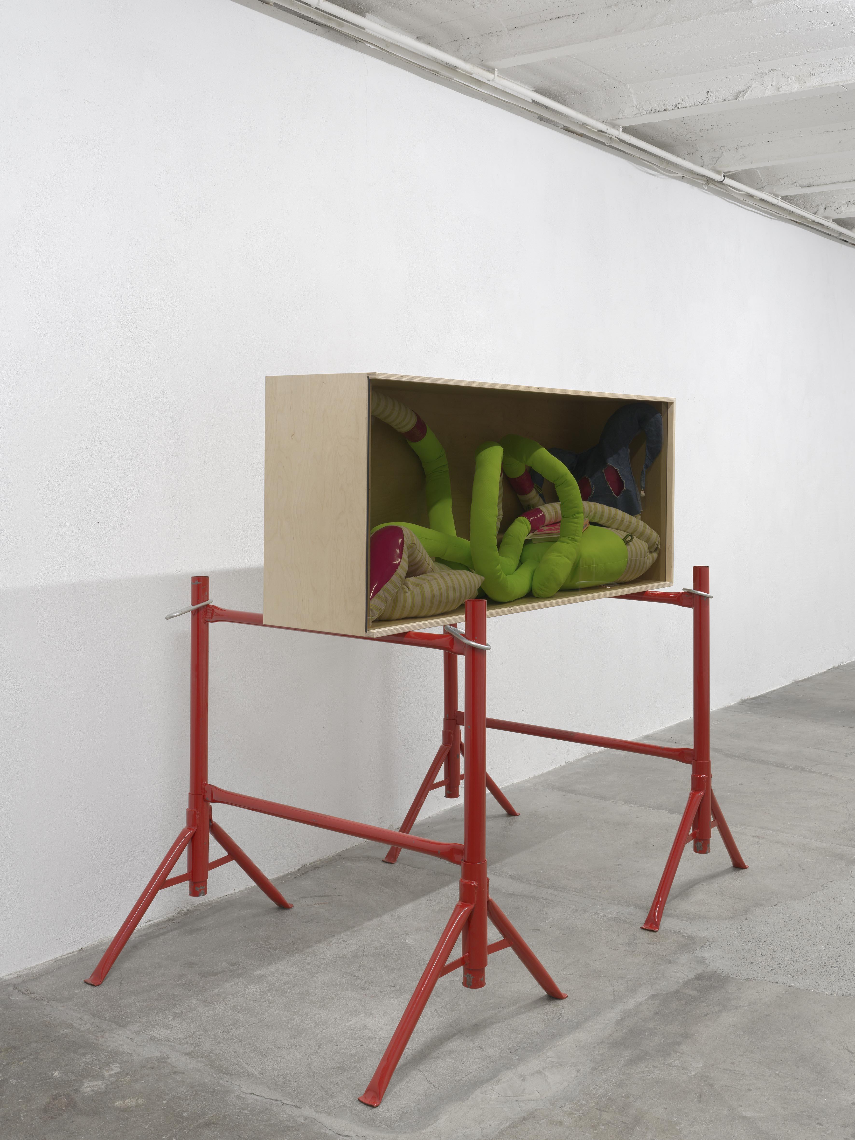Here to Stay, 2024, wood, safety glass, steel, vinyl, denim, polyester, synthetic wadding, book, 150 Ă— 148 Ă— 95 cm