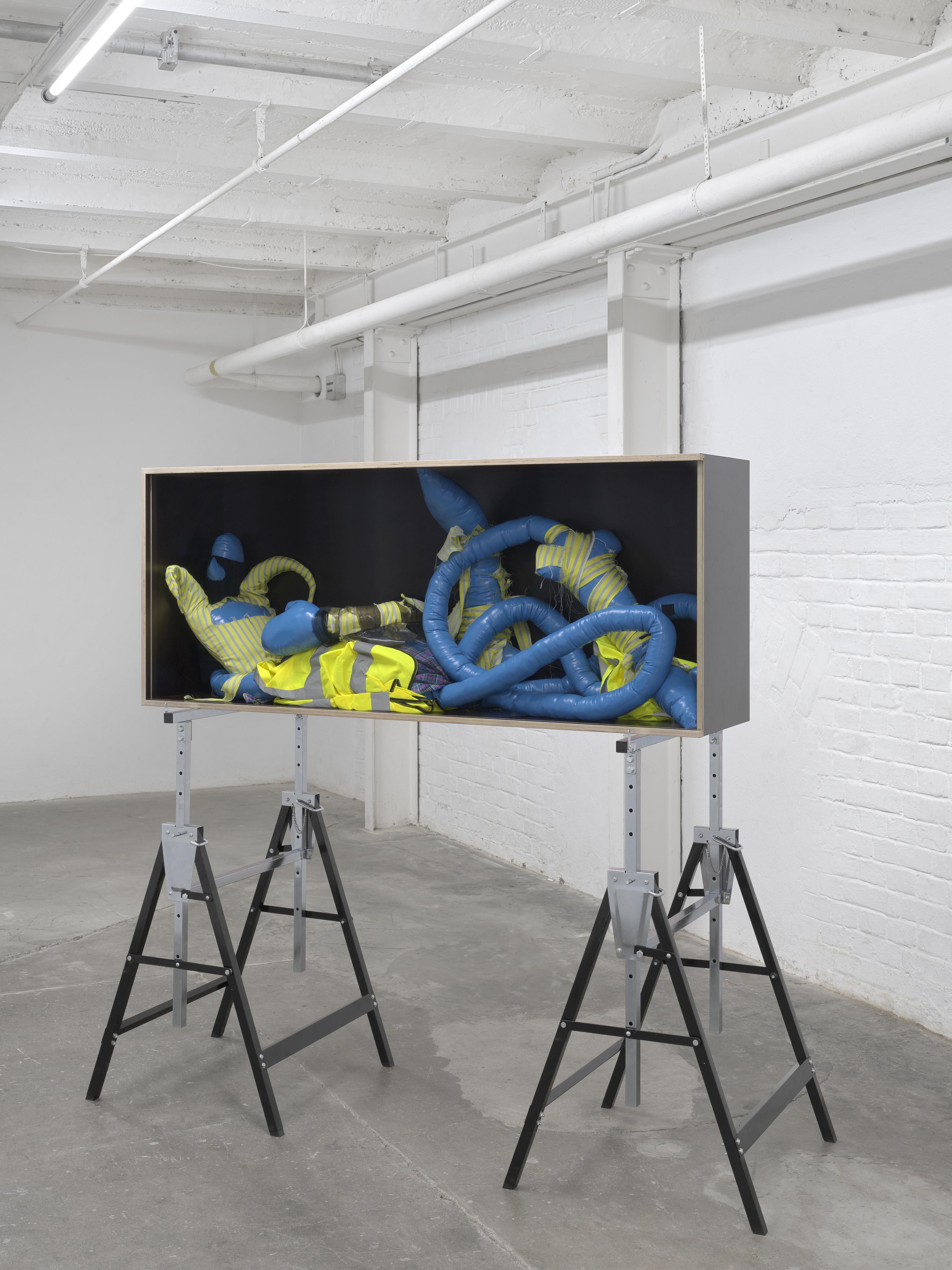 Make Sense of the World, Destroy It, 2024, wood, safety glass, steel, vinyl, denim, polyester, synthetic wadding, 140 Ă— 148 Ă— 68 cm