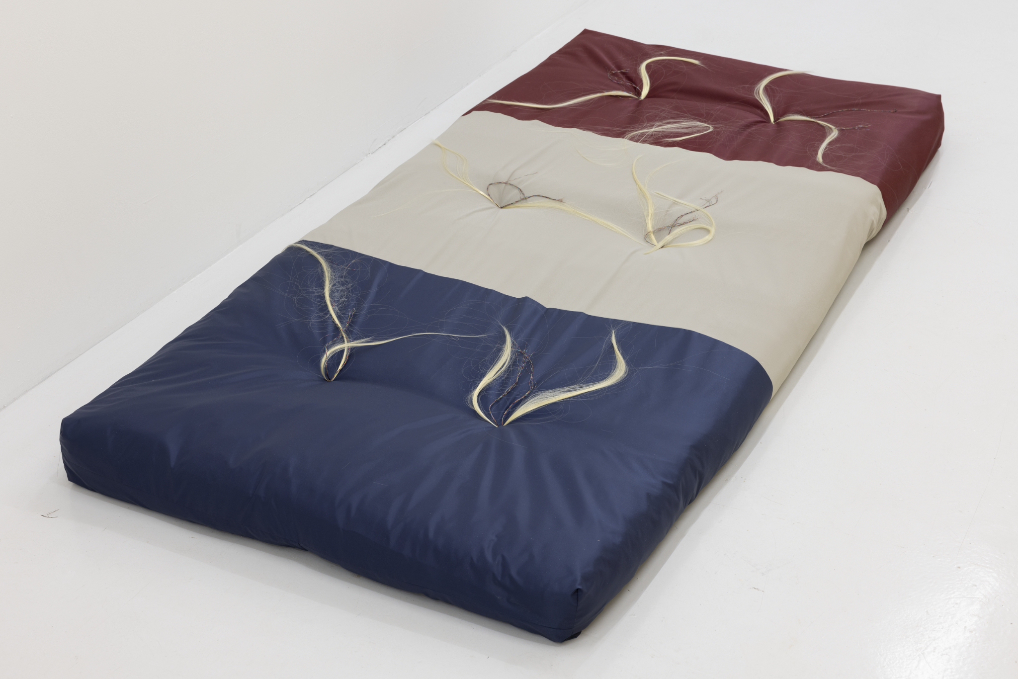 Ombrage, 2024, Polyester, cotton, cotton filling, synthetic hair  90 x 200 x 15 cm