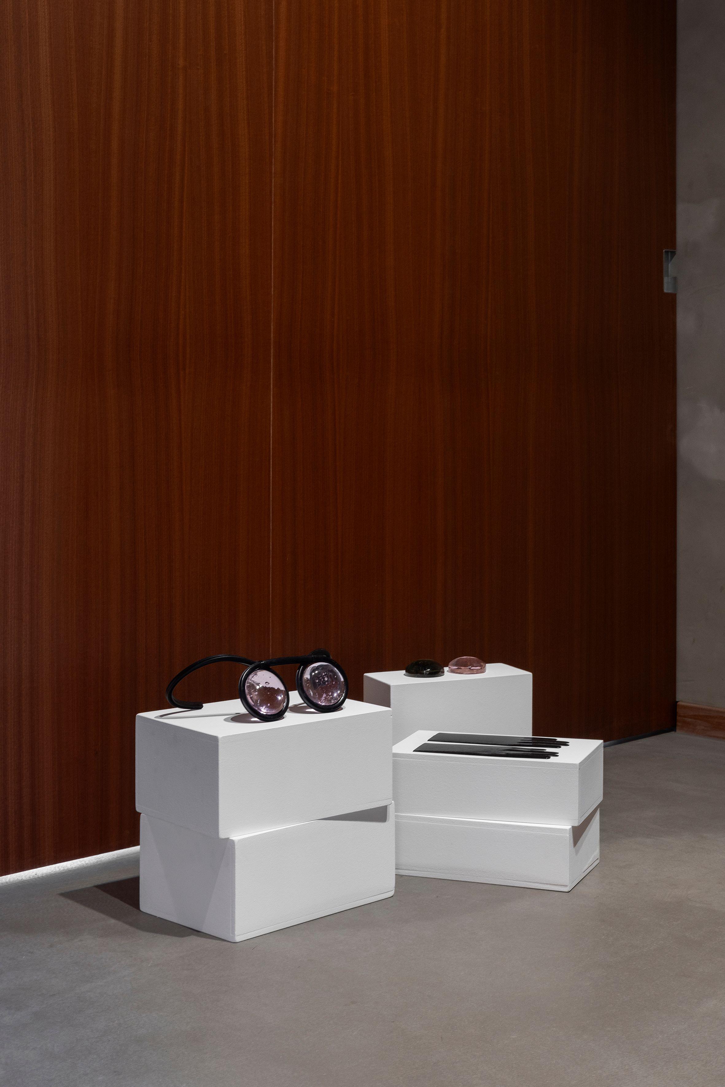 Room of the Past - Installation view: Lunettes de l’atelier, Kamil Bouzoubaa-Grivel, 2021, Blown glass, flexible ruler, zip tie - Paire de gants, Kamil Bouzoubaa-Grivel, 2021, Embossed paper