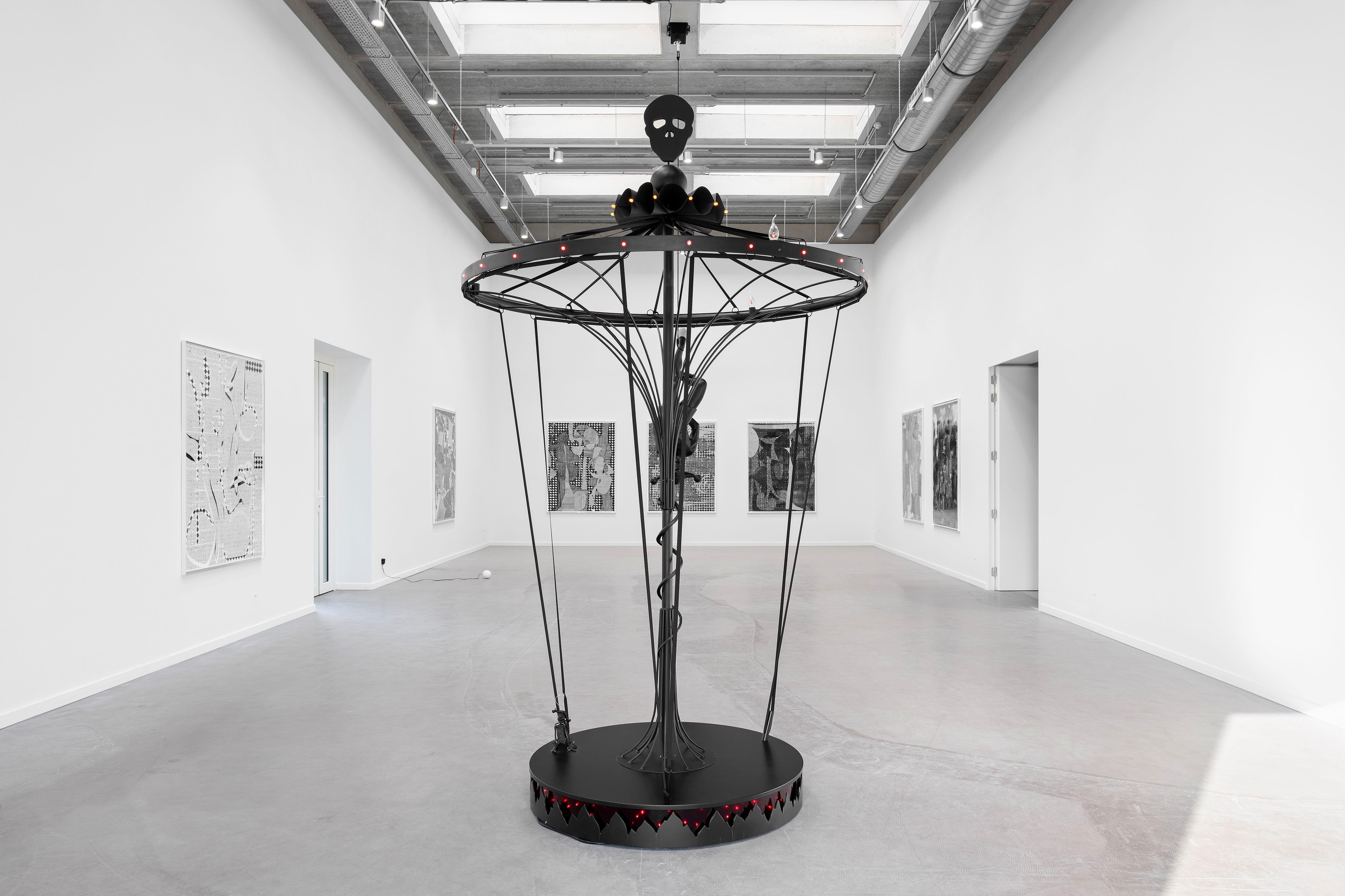 Carrousel of Death, Julie Béna, 2024, Powder coated steel, wood, plexiglass, electric system, bulbs, elastic