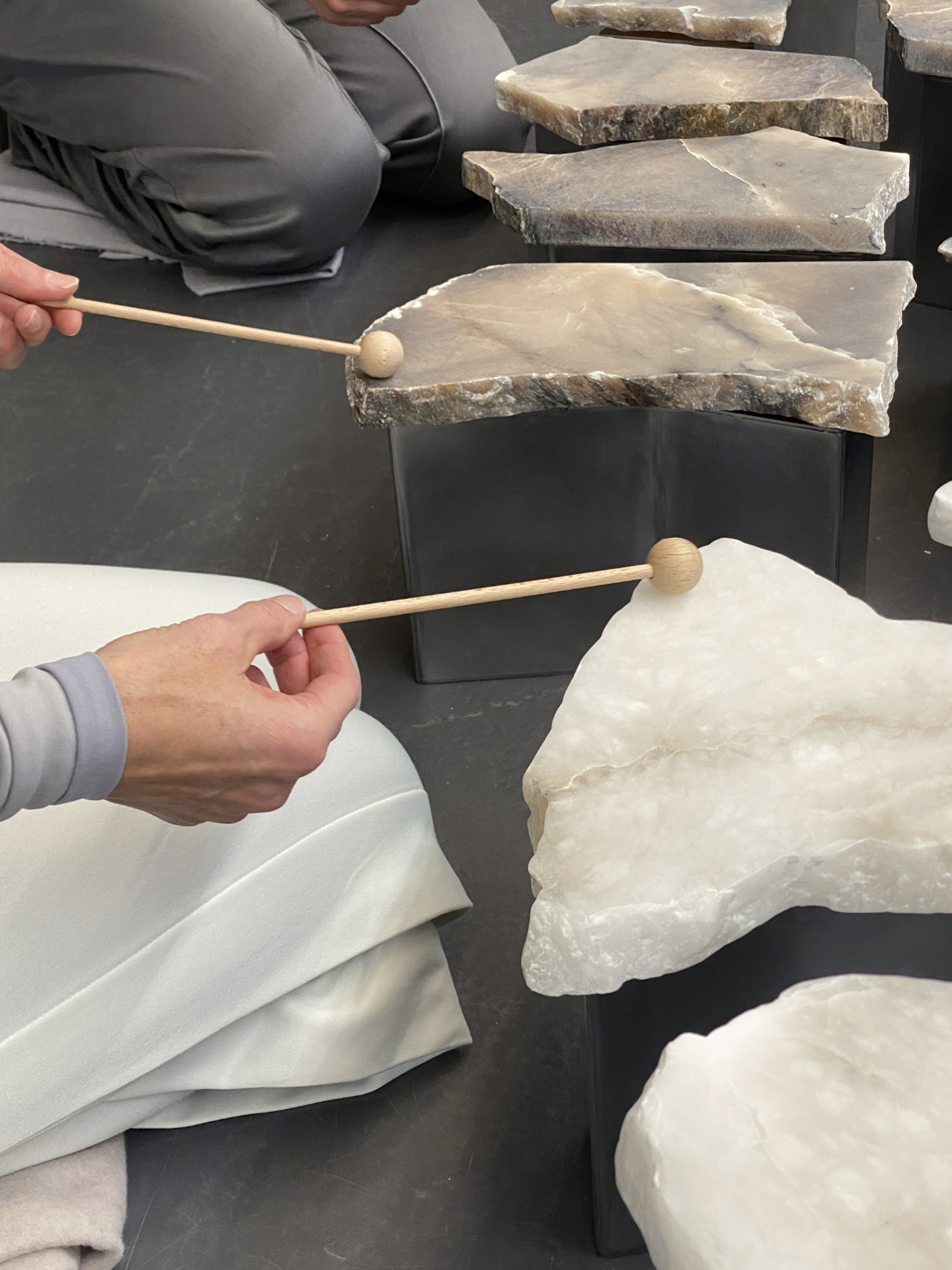Sibylle Eimermacher, sound performance on alabaster lithophones; Performers: Anneke Ingwersen, Camiela Warringa, Sibylle Eimermacher; Fashion design: Mirte Engelhard a.o., 2024