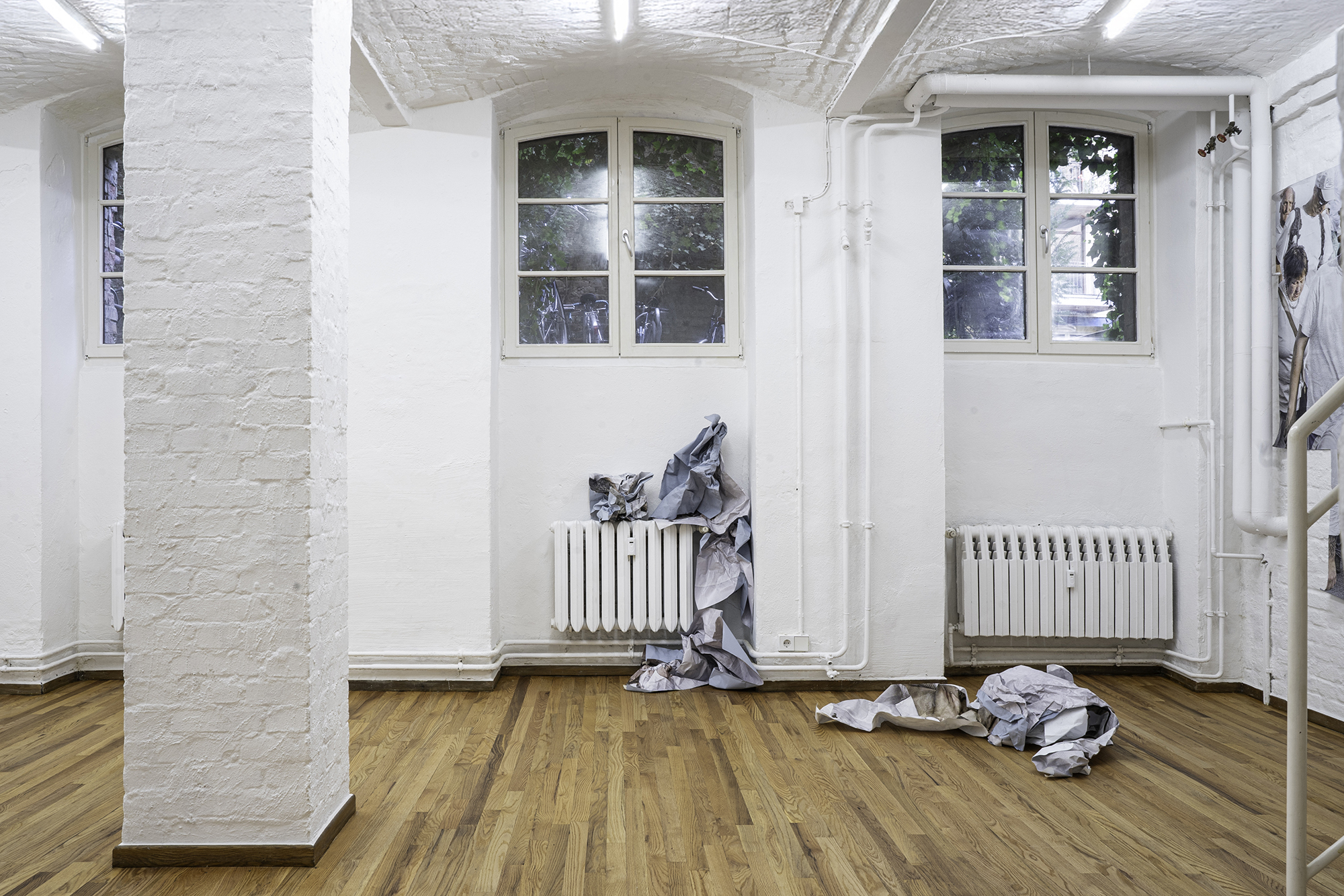 Satoshi Fujiwara, Bleached, Print on blueback paper, 2017â2023. Courtesy the artist. Installation view of the exhibition Bleached at red, Berlin, 2024.