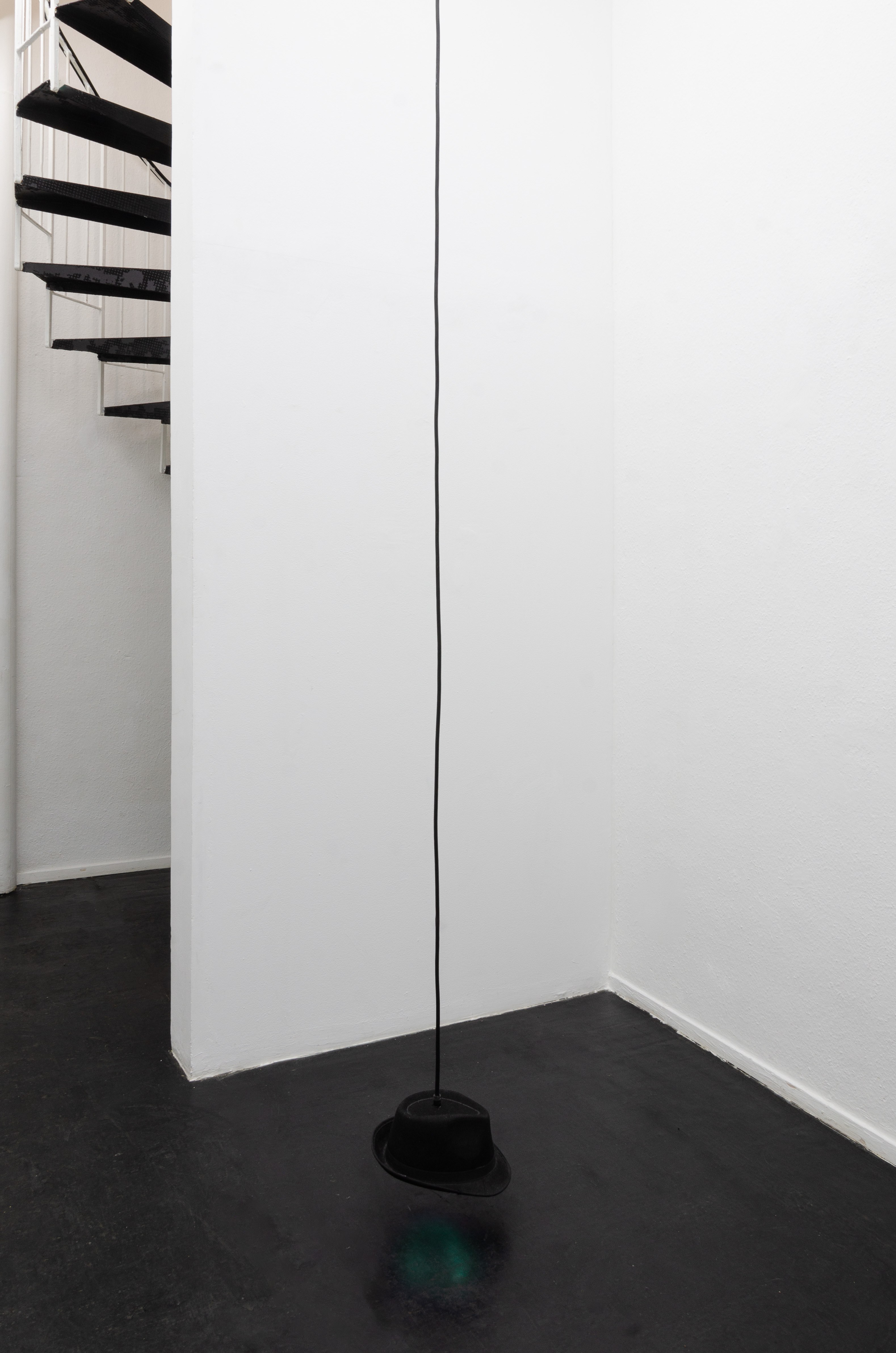 Connor Crawford, Flughafenhut, 2024, Hat, power cable, RGB led strip, MP3 player, speaker, electronics, mp3 playlist (9 files, runtime 28min 20sec), Dimensions variable