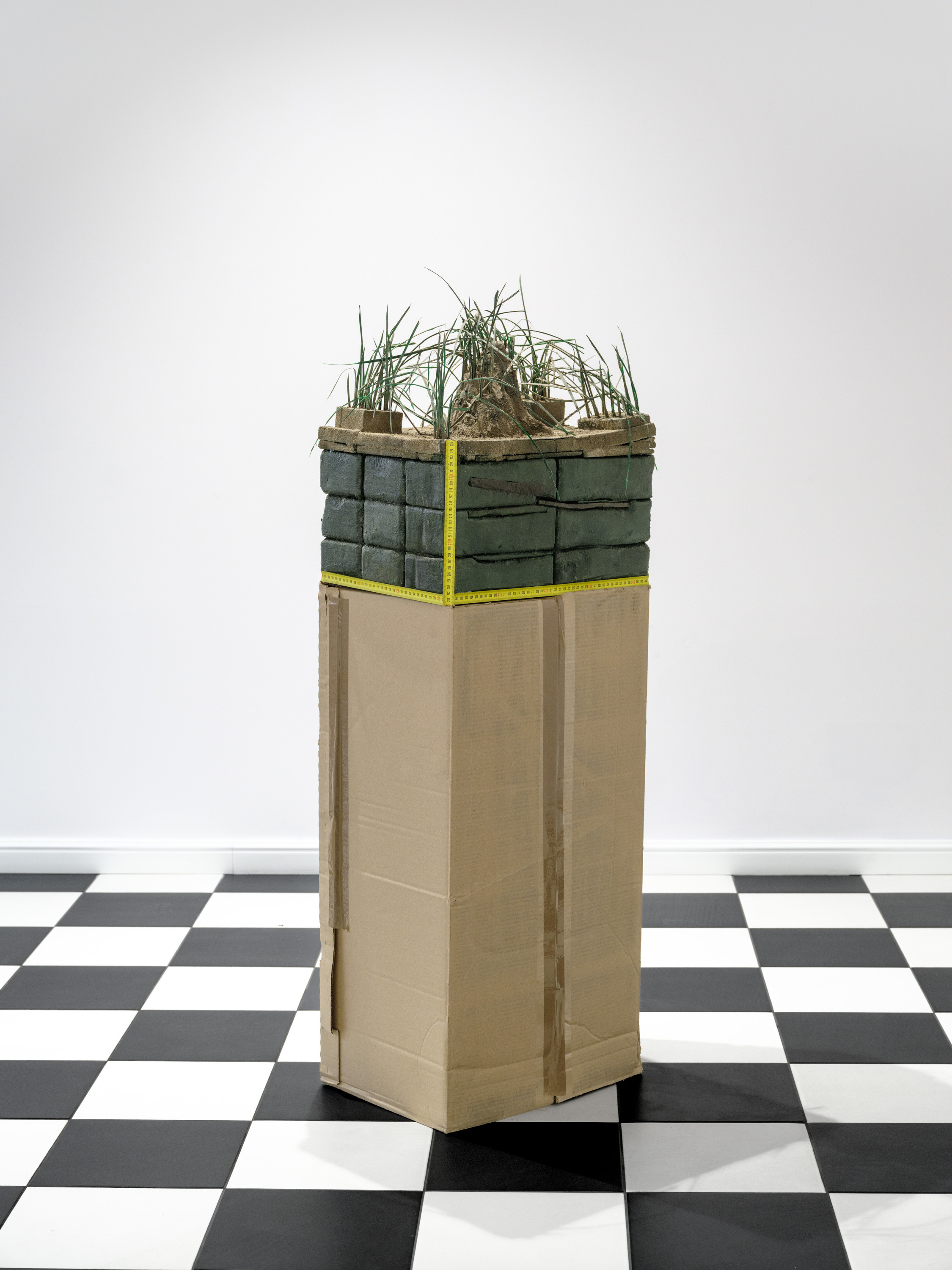 Piotr Kowalski "Soil cross-section", 2024, flower foam, plastic, clay, measuring tape, 50 x 45 x 32 cm